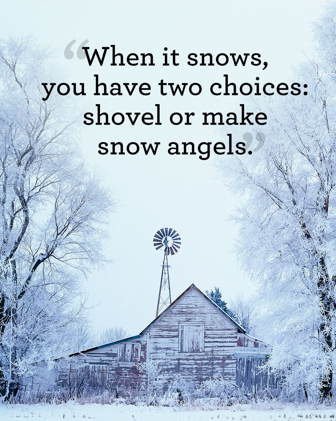 A serene winter scene with a snow-covered barn, windmill, and trees, perfect for a snow angel
