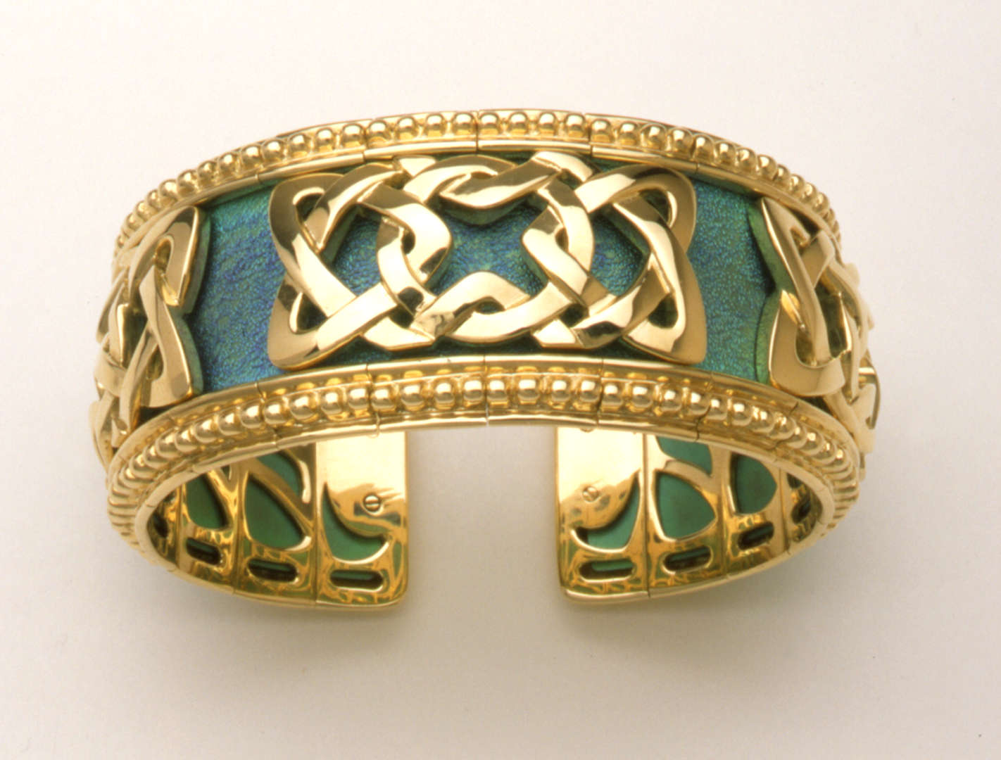 Gold And Titanium Celtic Knot Flexible Cuff