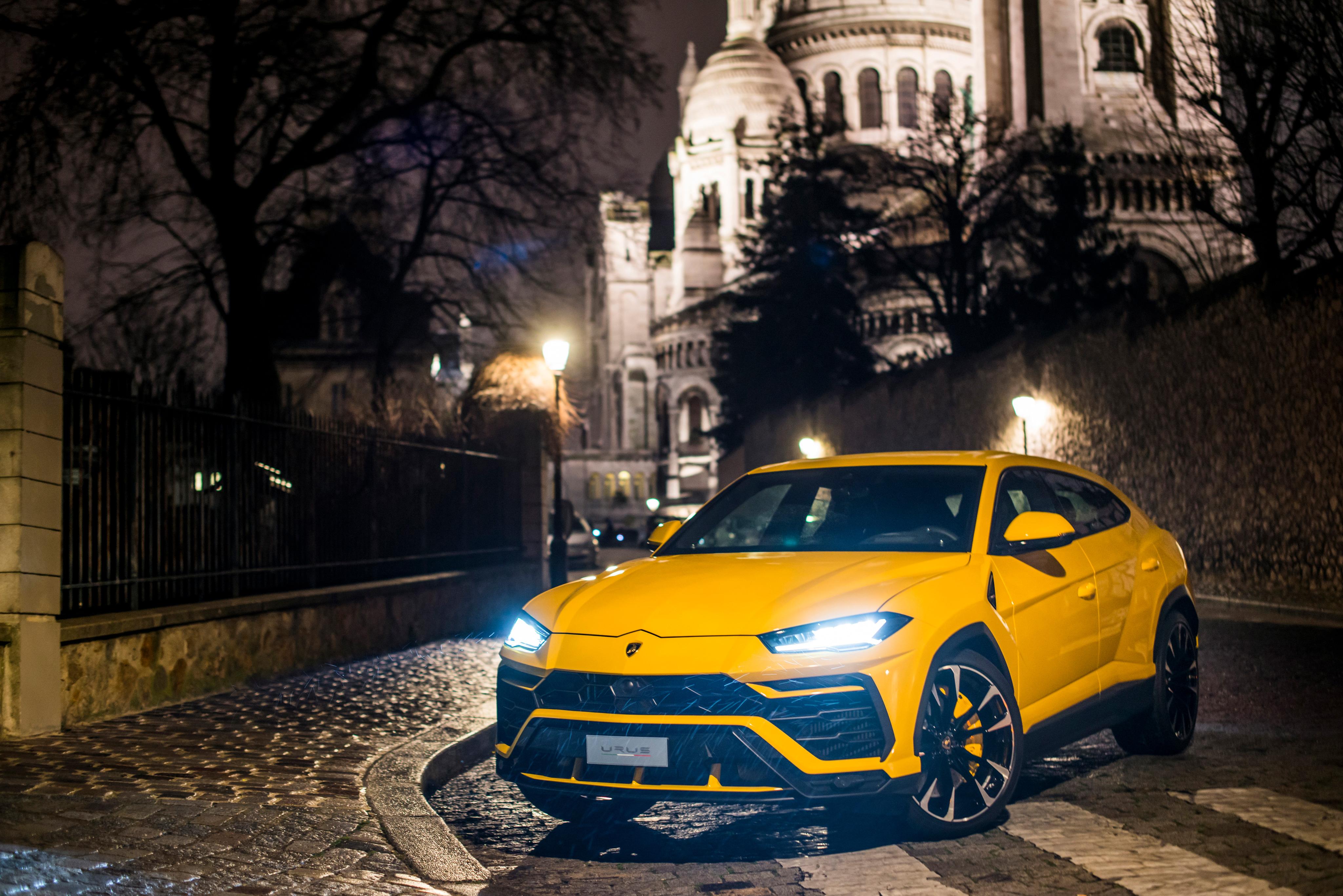 Yellow Off Road Car Lamborghini Urus On A Night Street Desktop