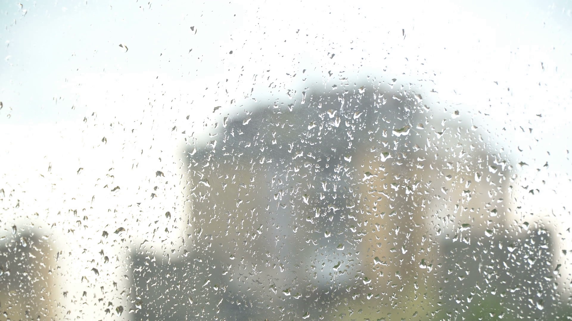 Rainy Day Rain Drops On The Window Dull Residential Building And