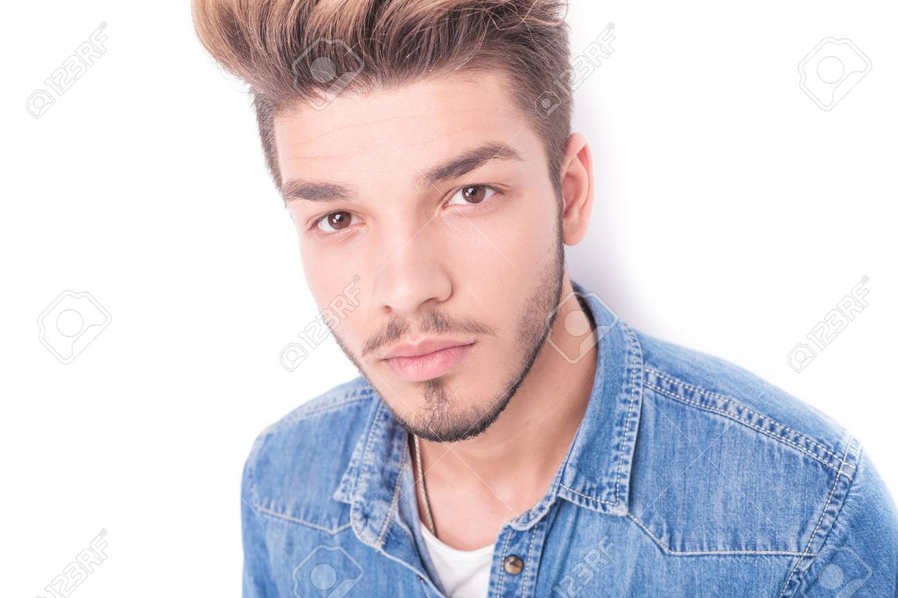 Closeup Picture Of A Young Causal Man S Face On White Background