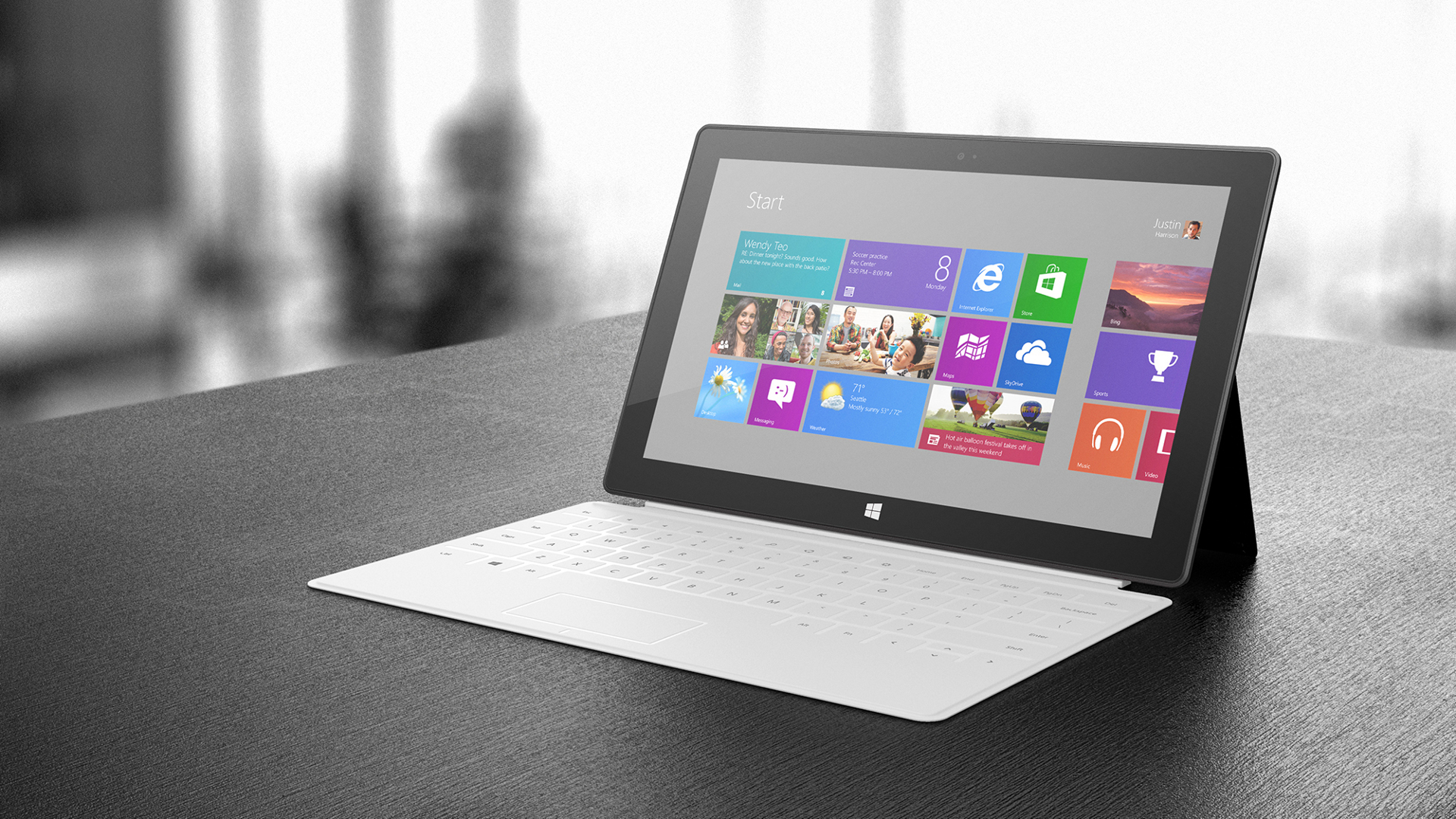 An Hd Wallpaper With Microsoft S Surface Tablet