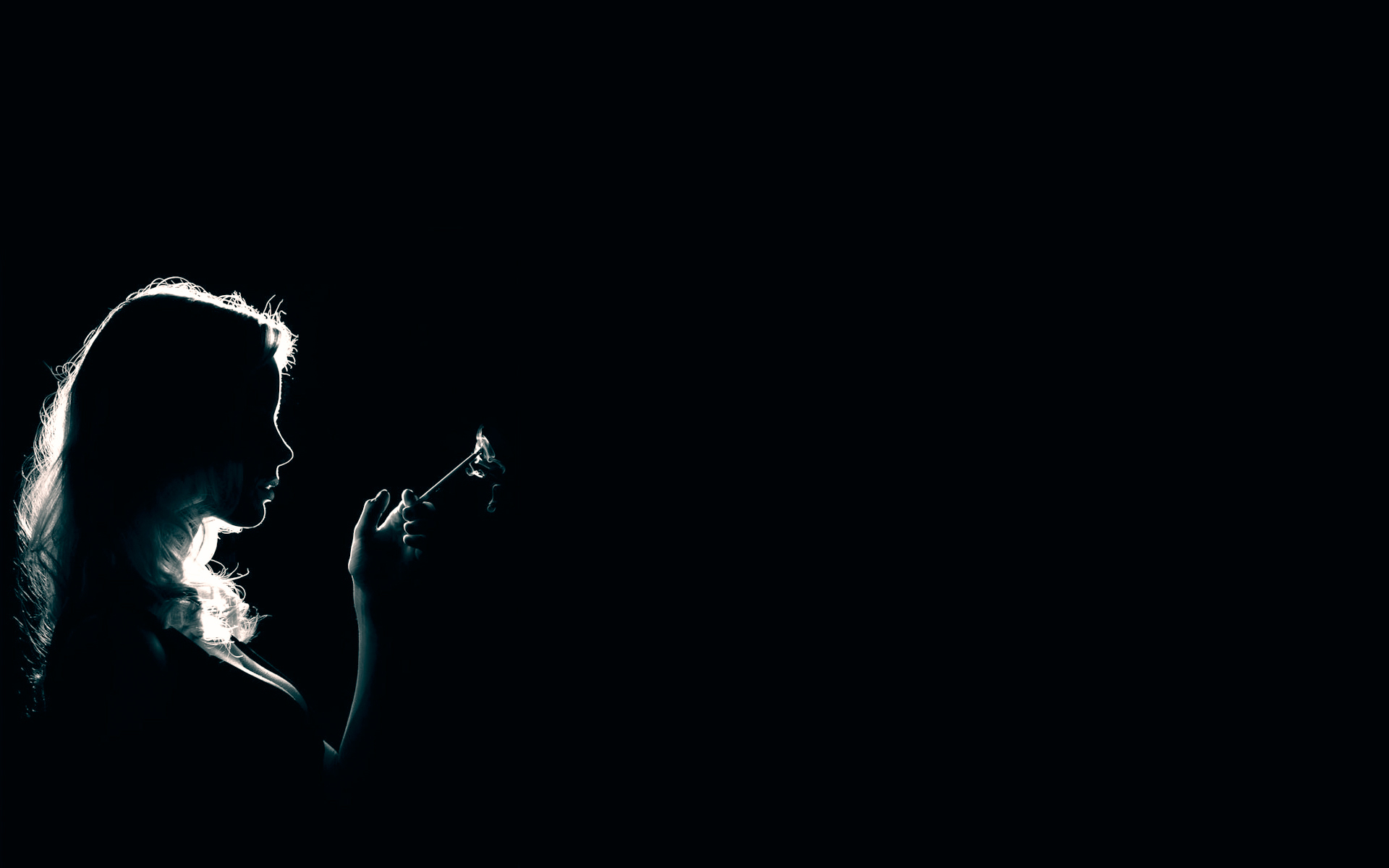 Girl Smoking Cigarettes Shadow On Black Background