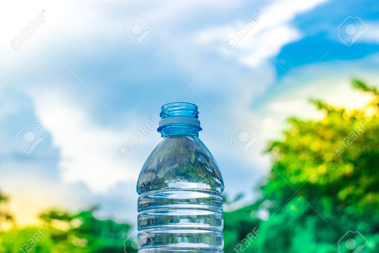 Bottle Water Made To Plastic On Sky And Tree Blurry Background 1300x866