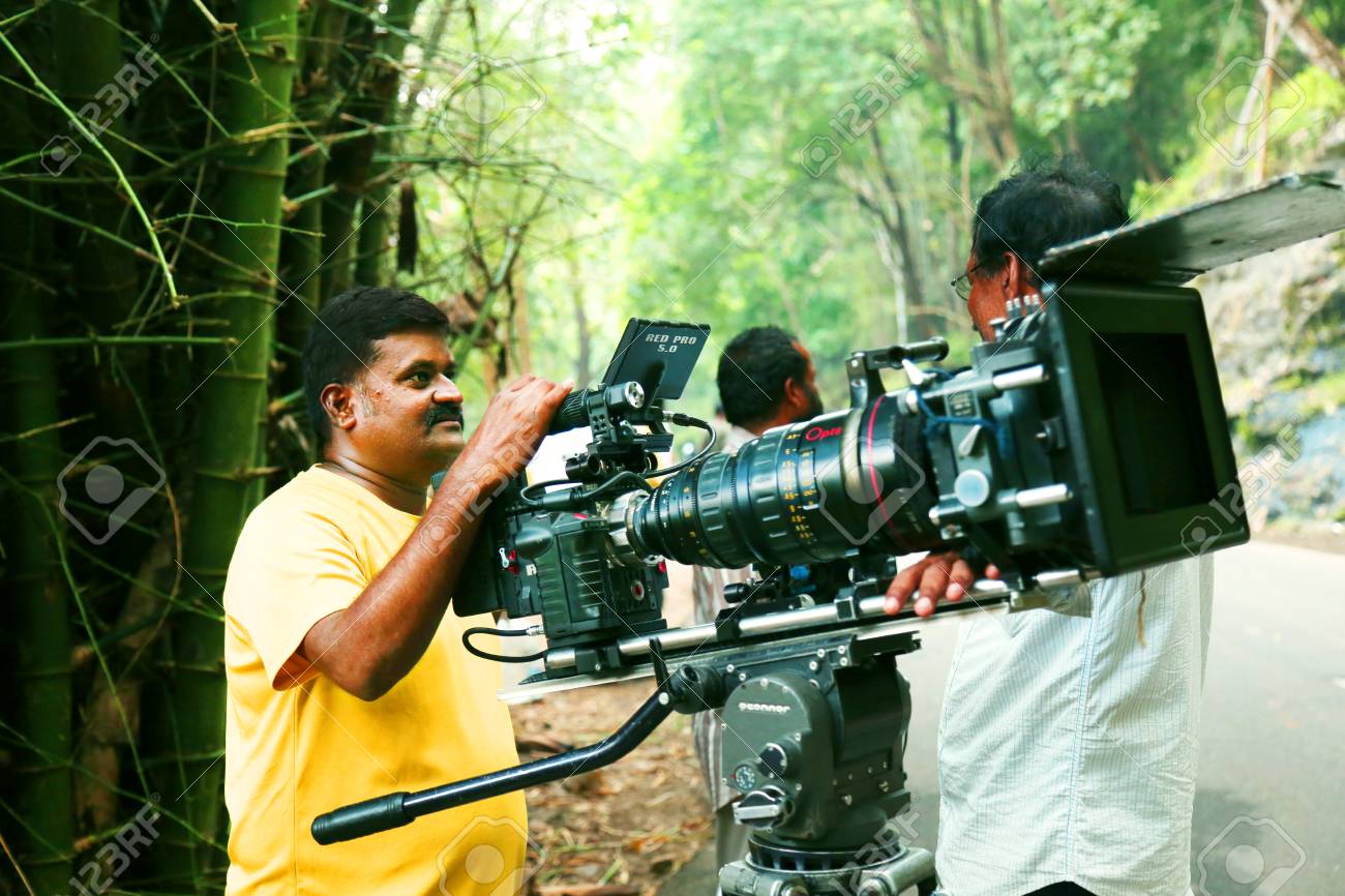 Video Camera Operator On Nature Background Film Shooting Spot