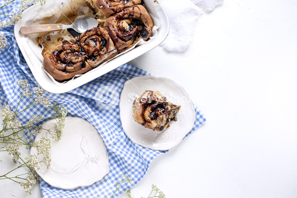Cinnabon With Chocolate Homemade Pastries In A Baking Dish On