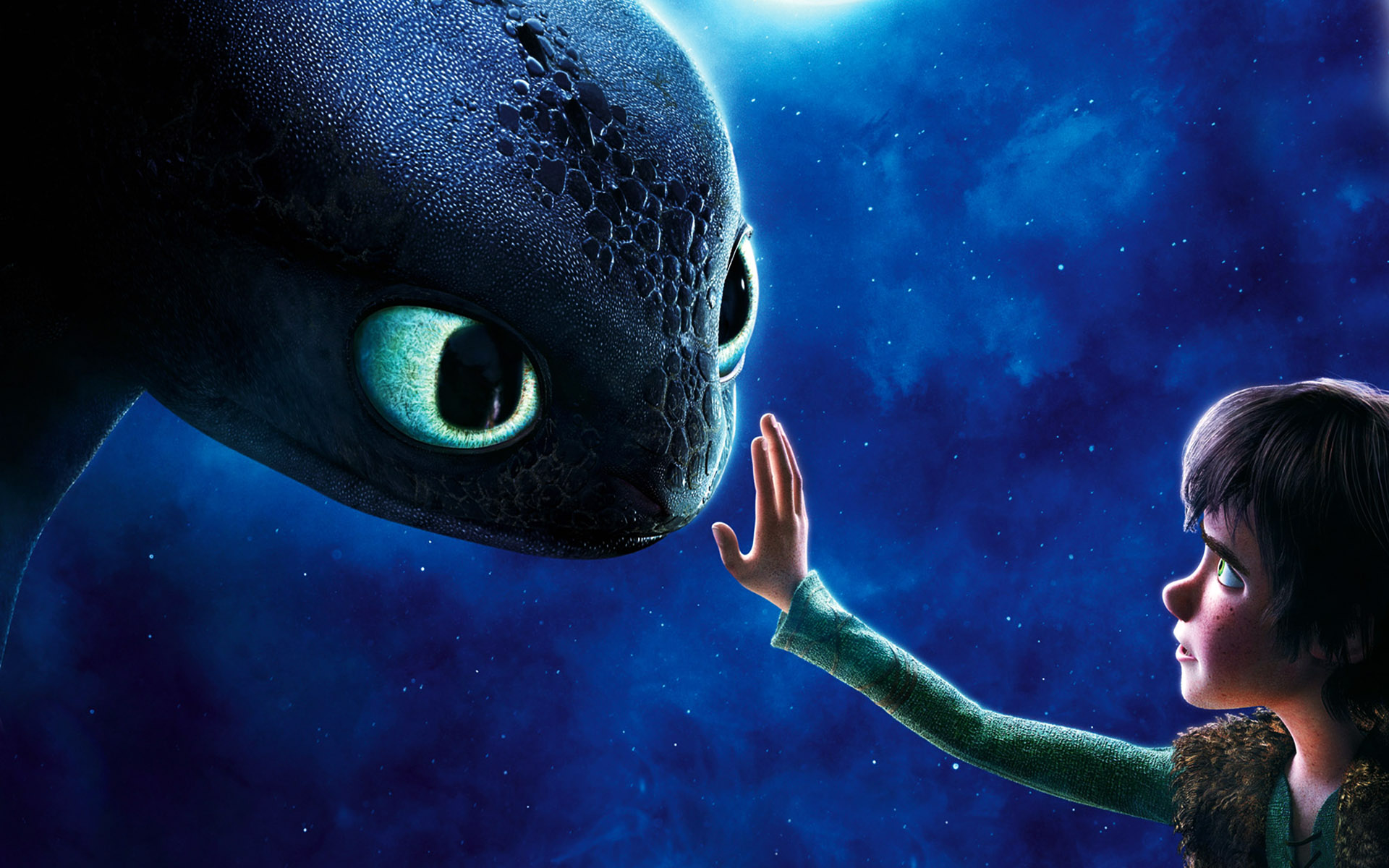 Toothless the dragon and Hiccup reaching for each other under the night sky in How to Train Your Dragon