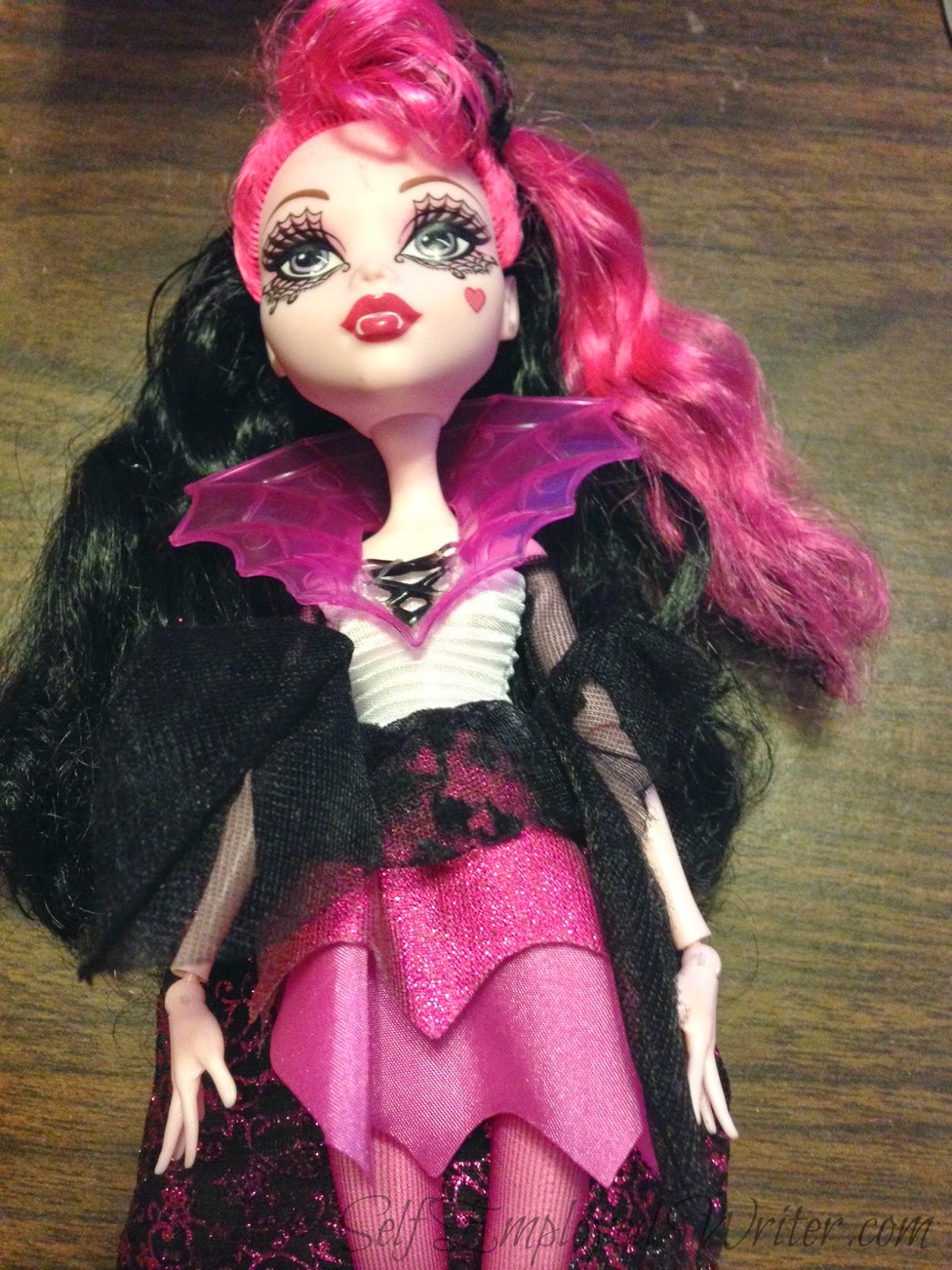 pink and black monster high doll