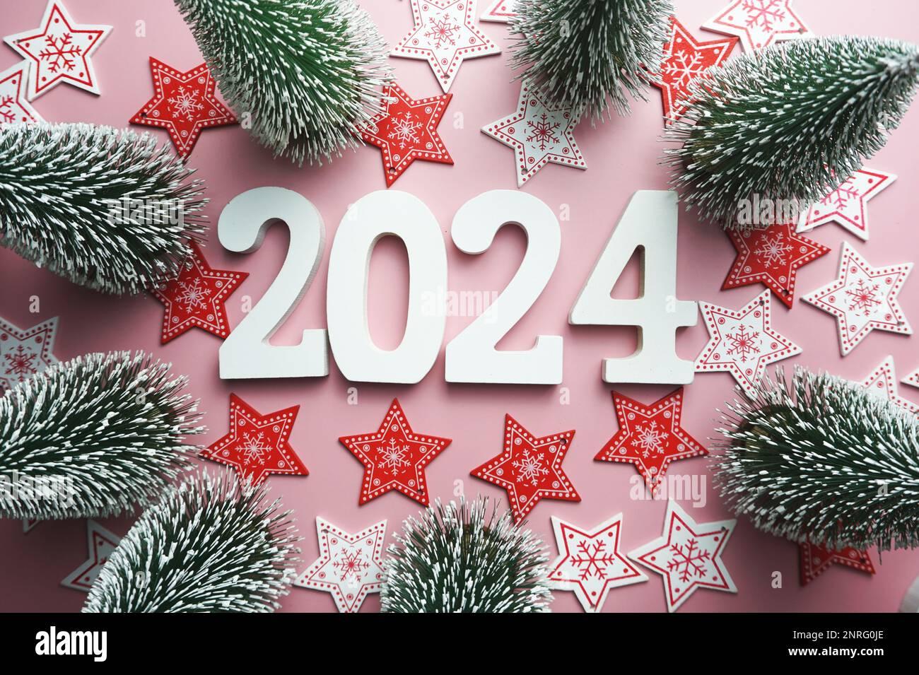  Happy New Year and Christmas decoration on pink background
