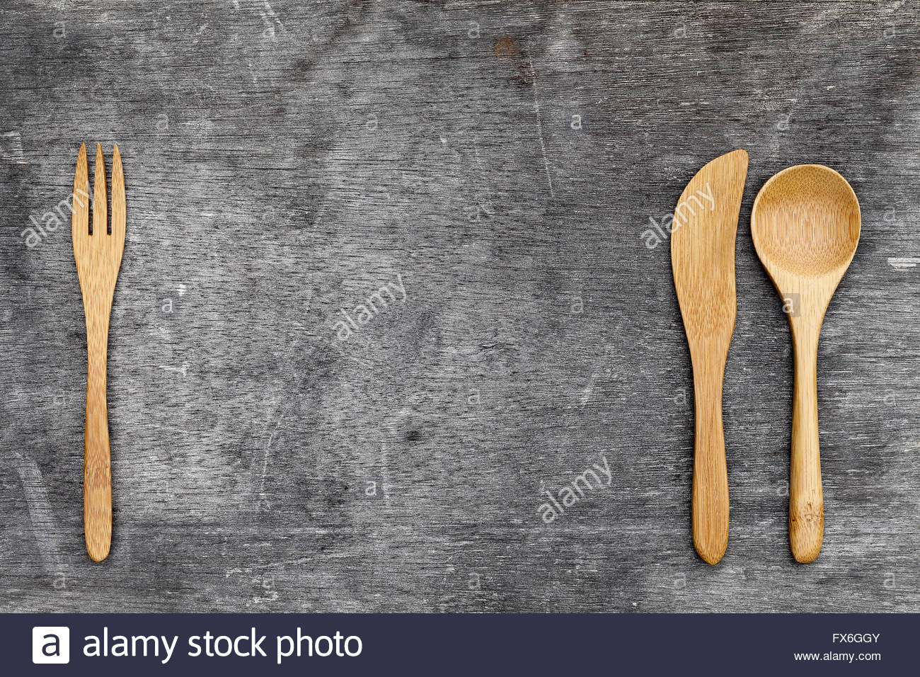 Wooden Spoon And Fork Knife On Grunge Wood Background Stock Photo