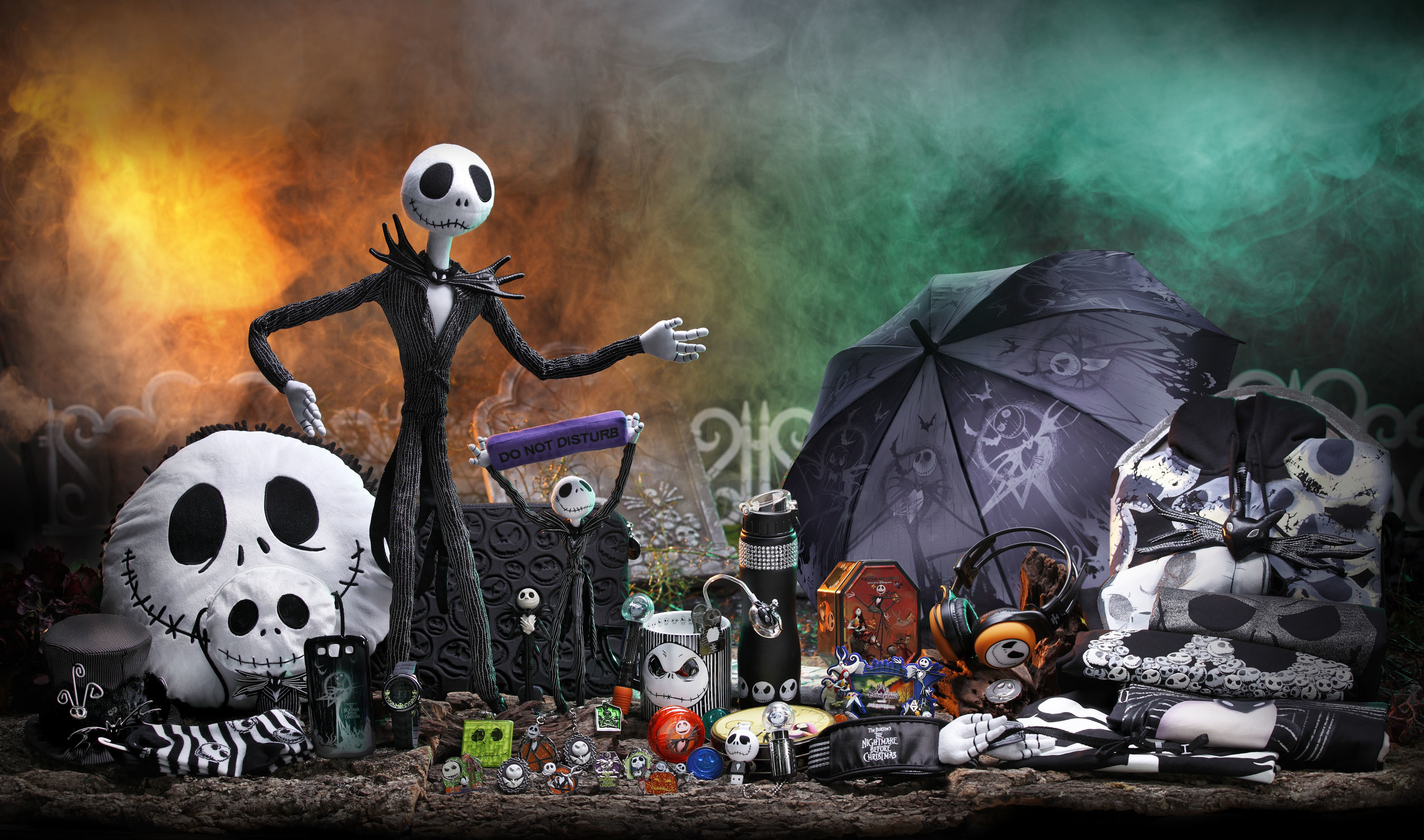 A collection of Nightmare Before Christmas merchandise displayed against a spooky backdrop, featuring Jack Skellington and other iconic characters from the film