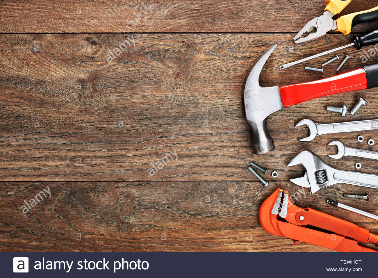 Assorted Work Tools On Wooden Background With Copy Space Stock
