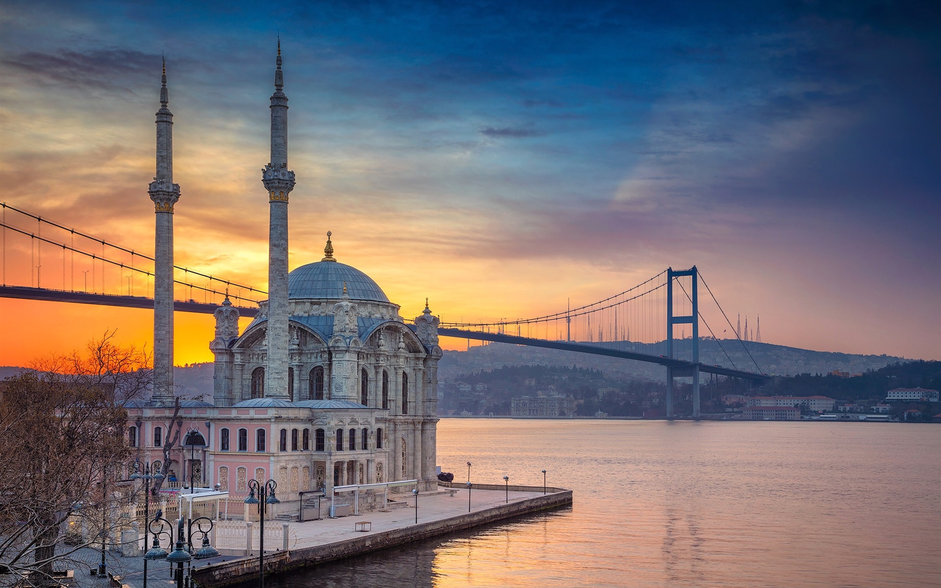 Ortaköy Mosque at sunset with the Bosphorus Bridge in the background, Istanbul, Turkey