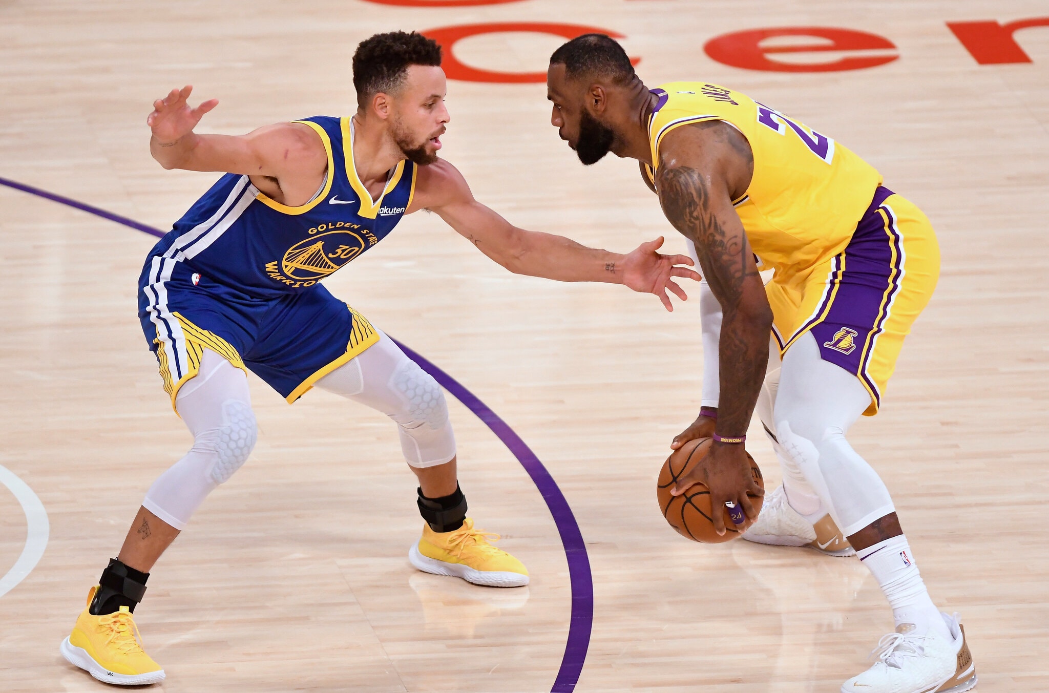 LeBron James and Stephen Curry face off during an NBA game