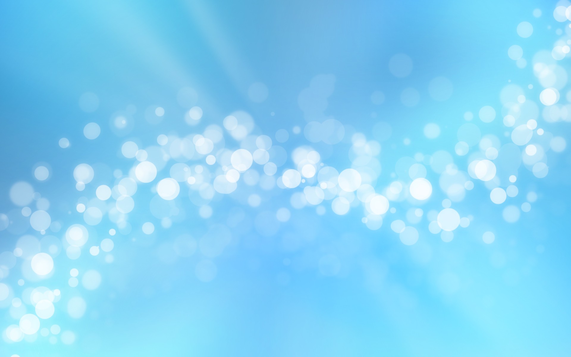 Abstract light blue background with bokeh effect, creating a soft and dreamy atmosphere