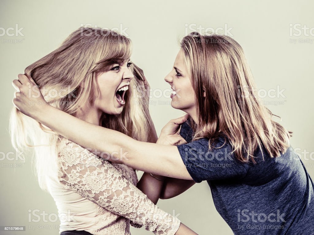 Aggressive Mad Women Fighting Each Other Stock Photo