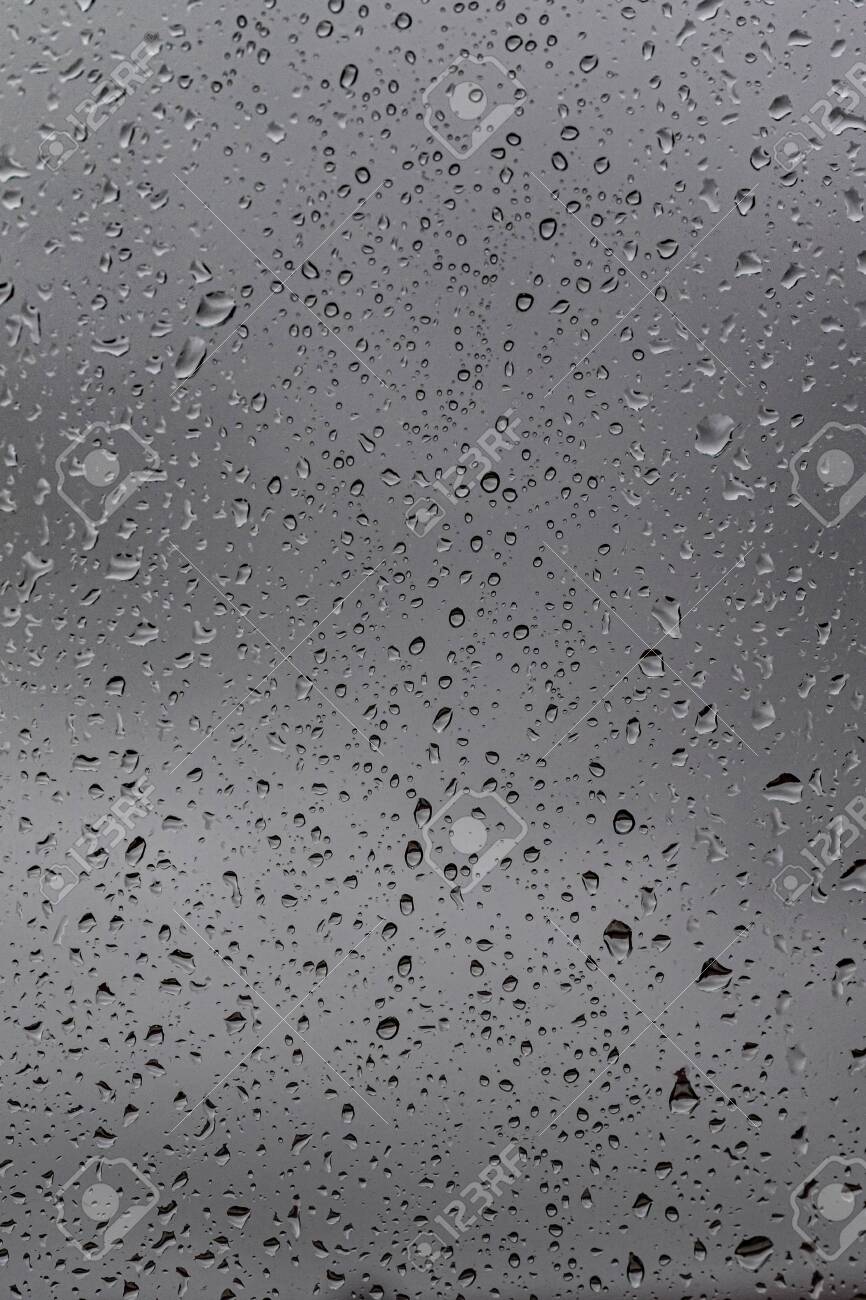 Raindrops On The Glass Gloomy Weather Gray Background Rain