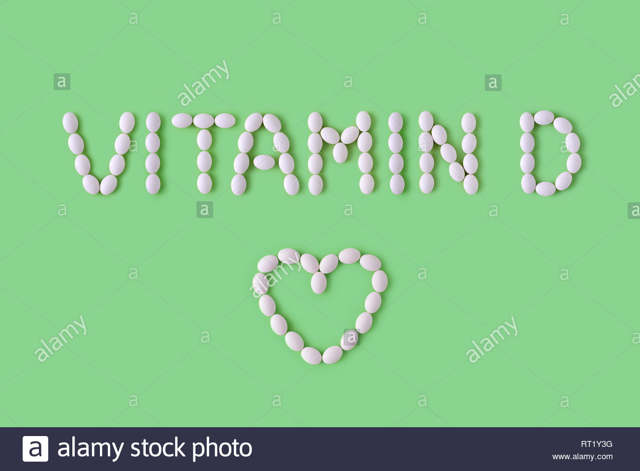 Vitamin D Pills Dropped From Bottle On Green Background Flat Lay