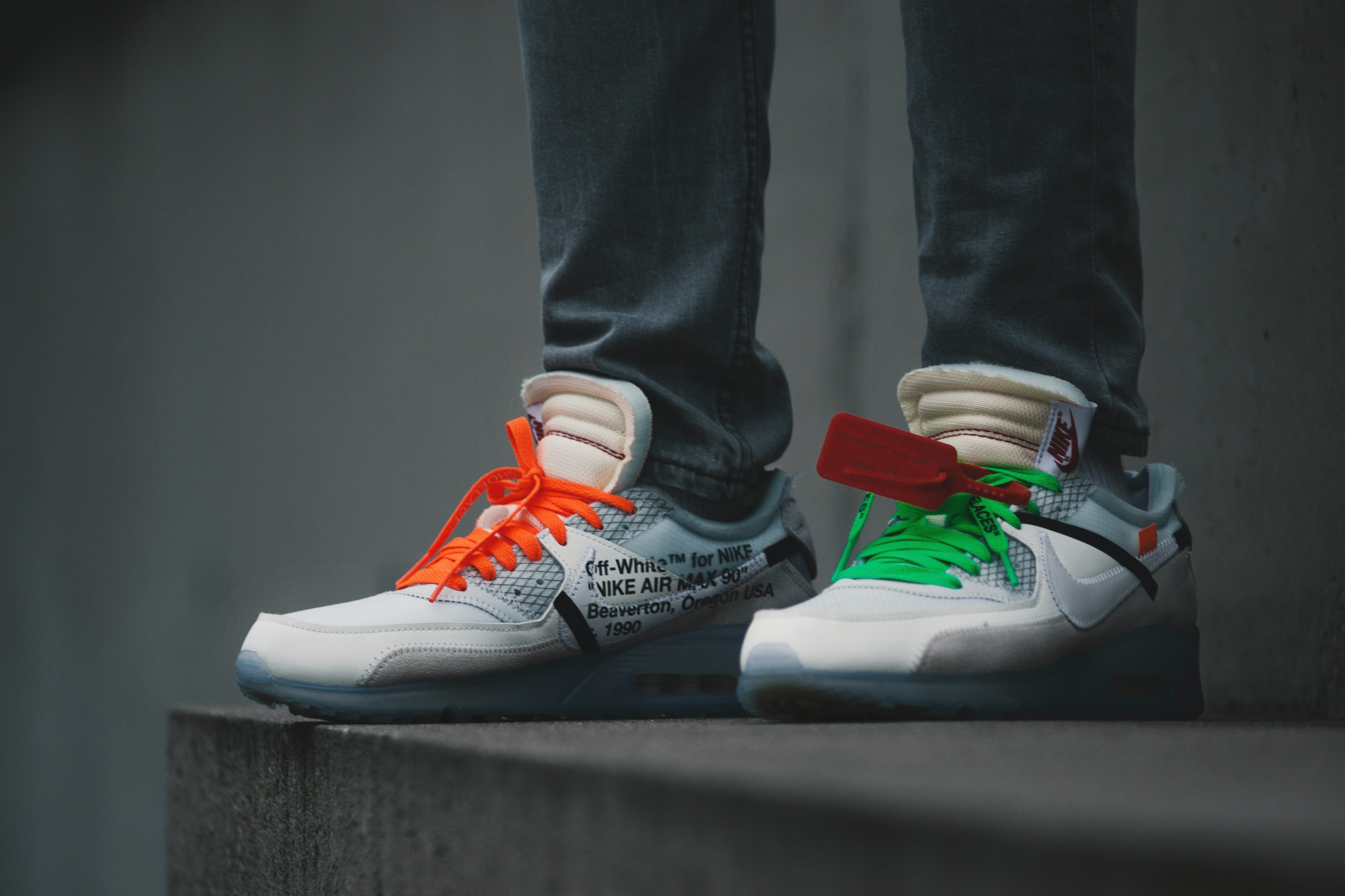 Person Wearing White Green And Orange Sneakers Photo Shoe