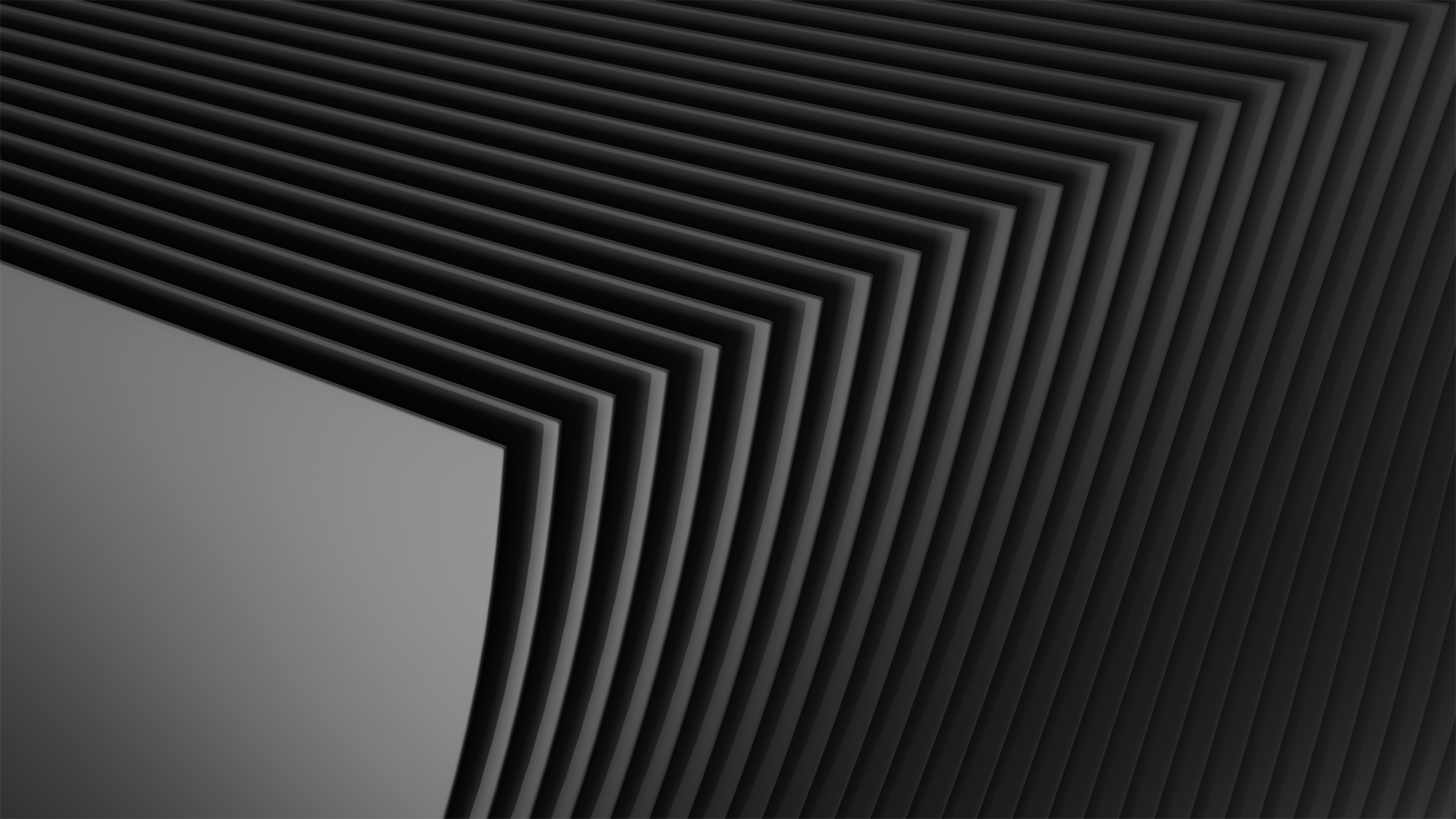 Abstract background with a dark gray curved structure, resembling stacked sheets of paper or metal. The lines and shadows create a sense of depth and dimension, suitable for a modern and minimalist wallpaper