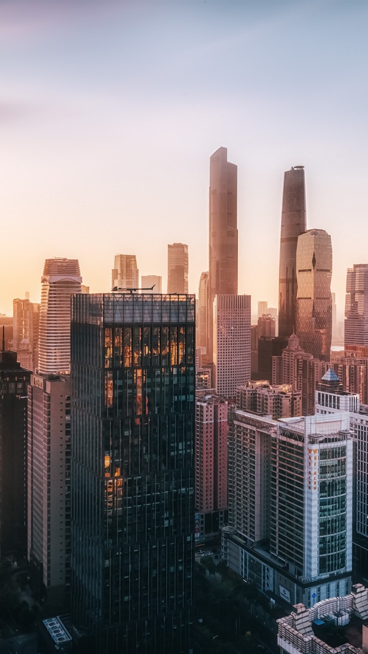 Morden city Guangzhou China skyscrapers morning sun rays