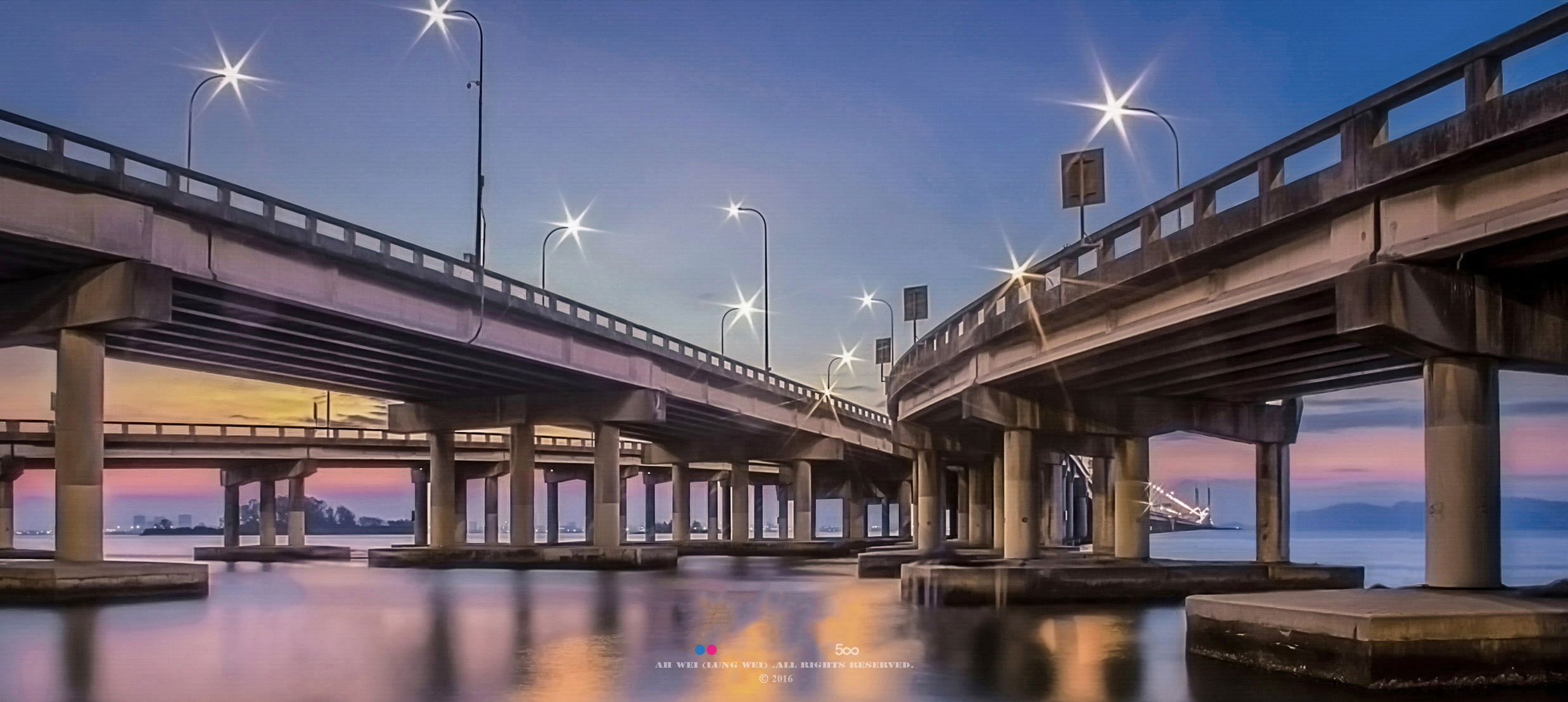 Suspension Bridge Under Body Of Water During Night Time Penang