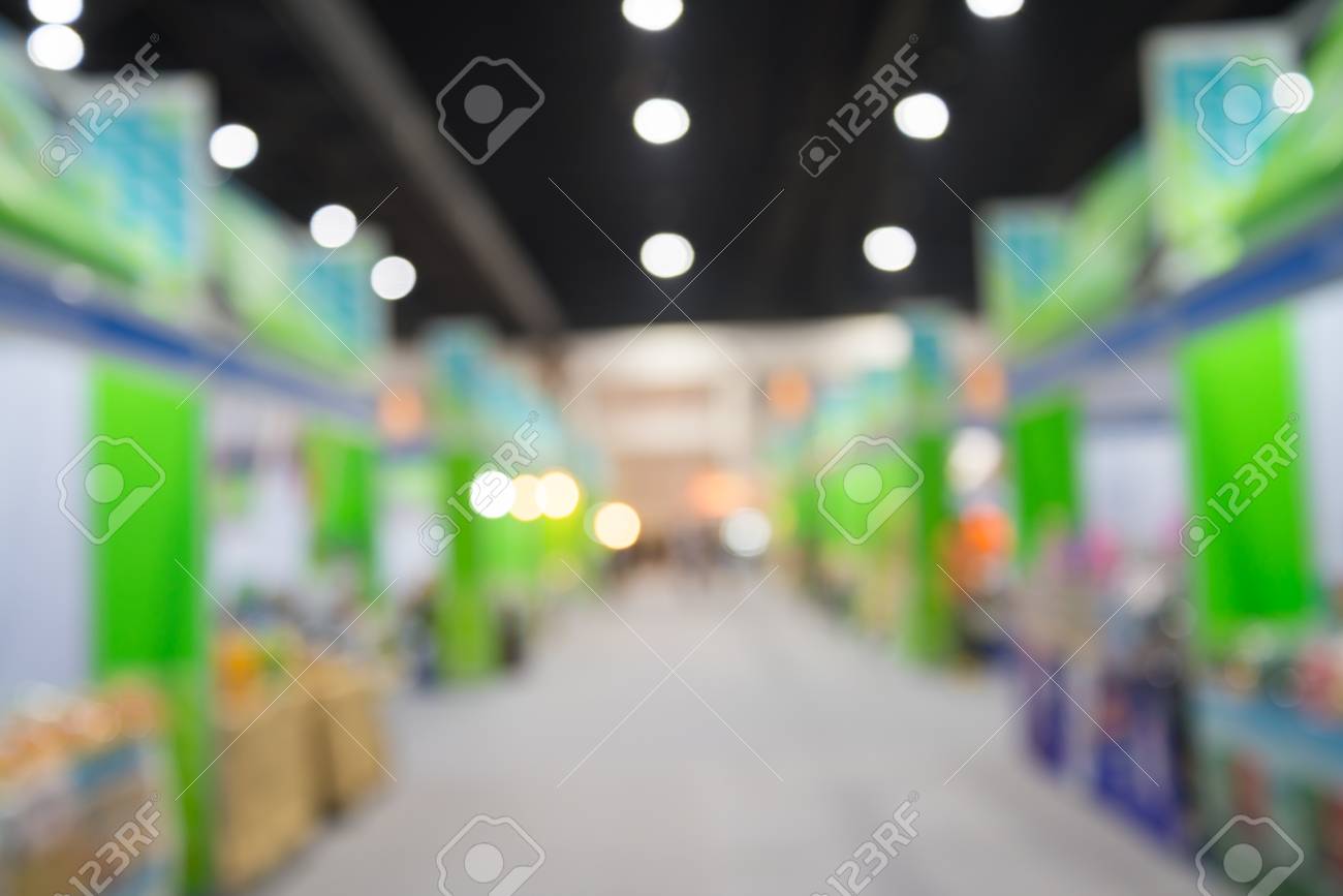 Abstract Blur People In Trade Show Expo Background Stock Photo