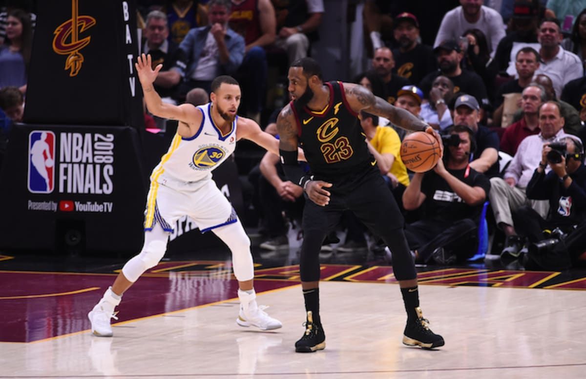 LeBron James and Stephen Curry face off during an NBA Finals game