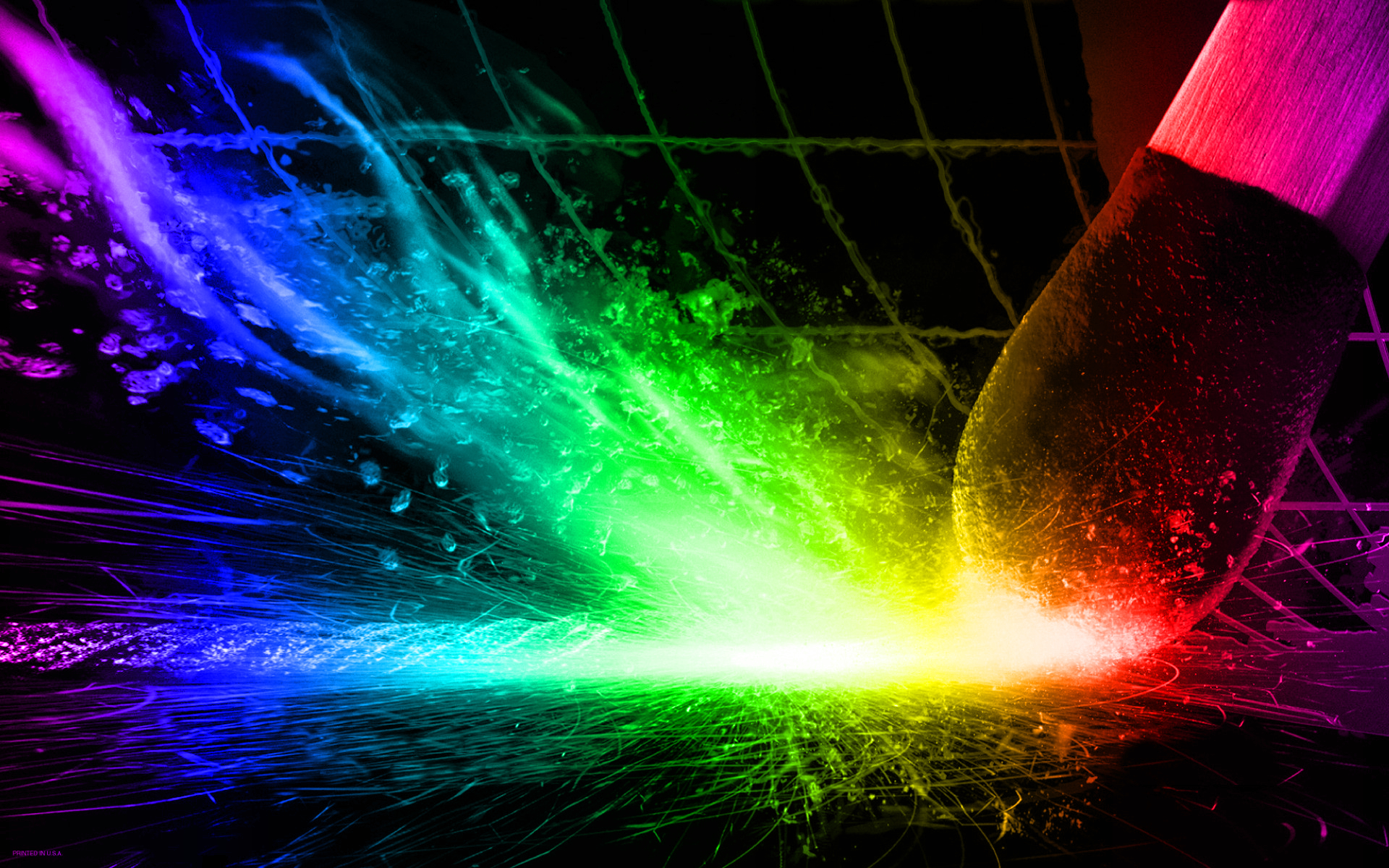 A vibrant and colorful abstract wallpaper featuring a spectrum of rainbow hues exploding from a dark background, suitable for PC desktops