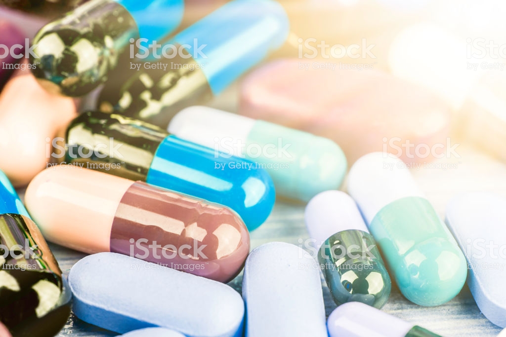 Medicine Pills Or Capsules On Wood Backgrounddrug Prescription For