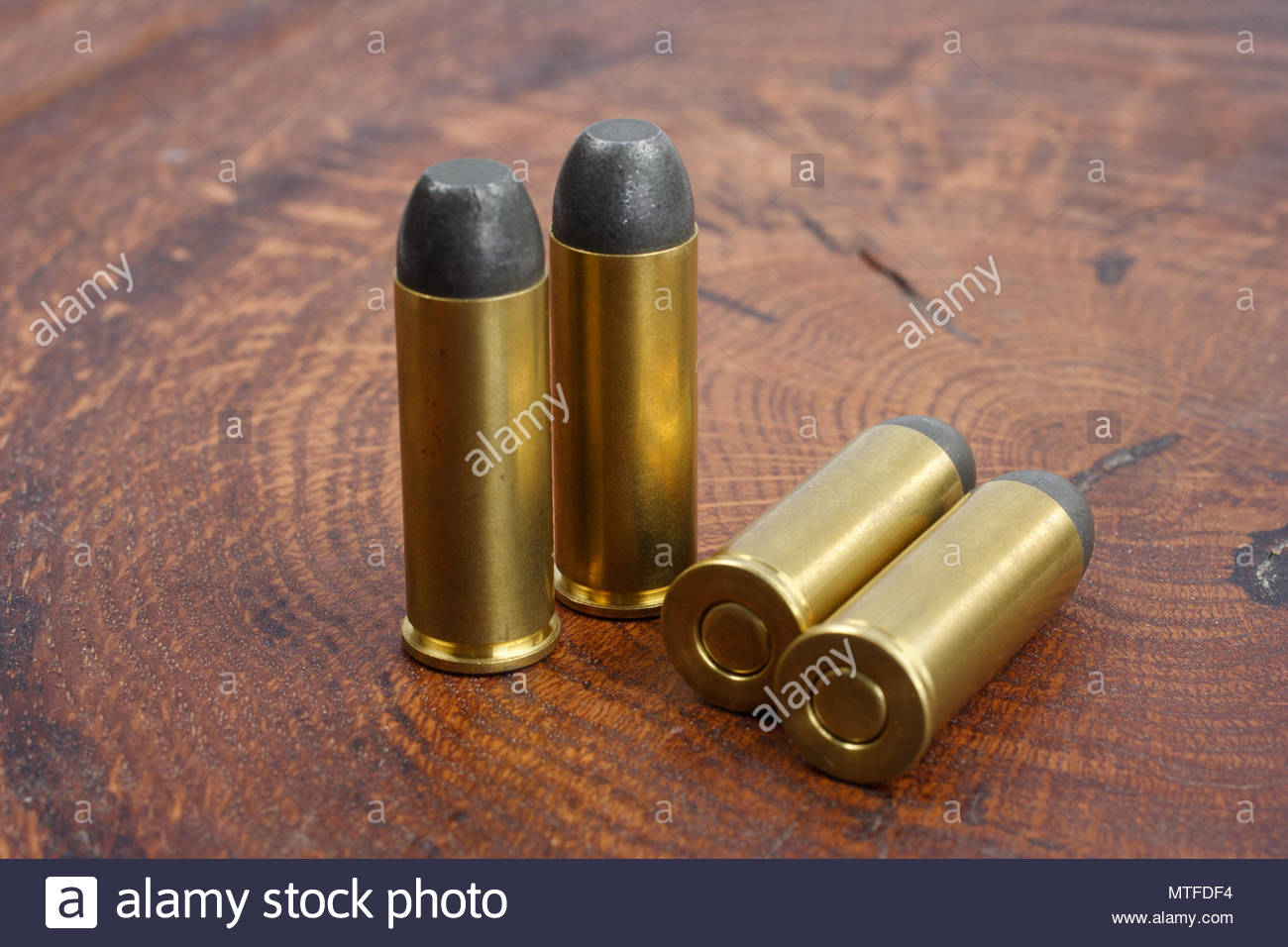Revolver Cartridges Cal Wild West Period On Wooden Background