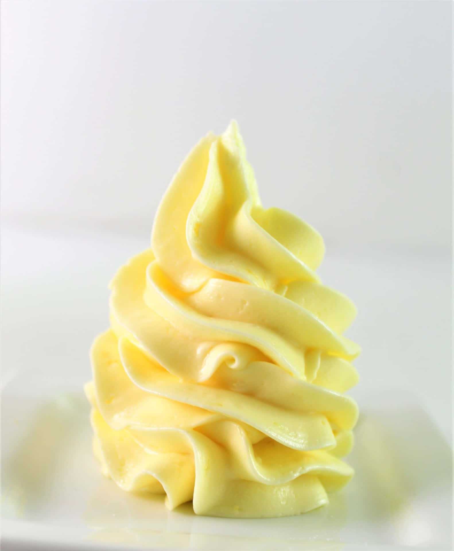 A Close Up Of Soft And Creamy Icing Cupcake Wallpaper