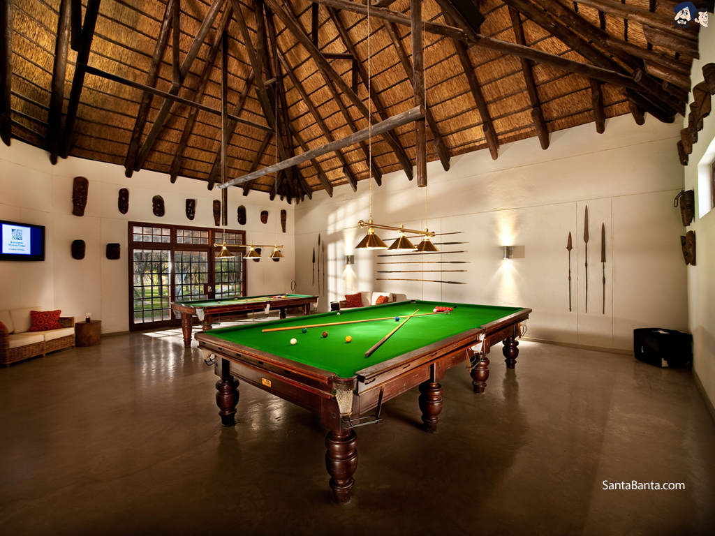 A Large Glorious Pool Table Room With Beautiful Interior Design