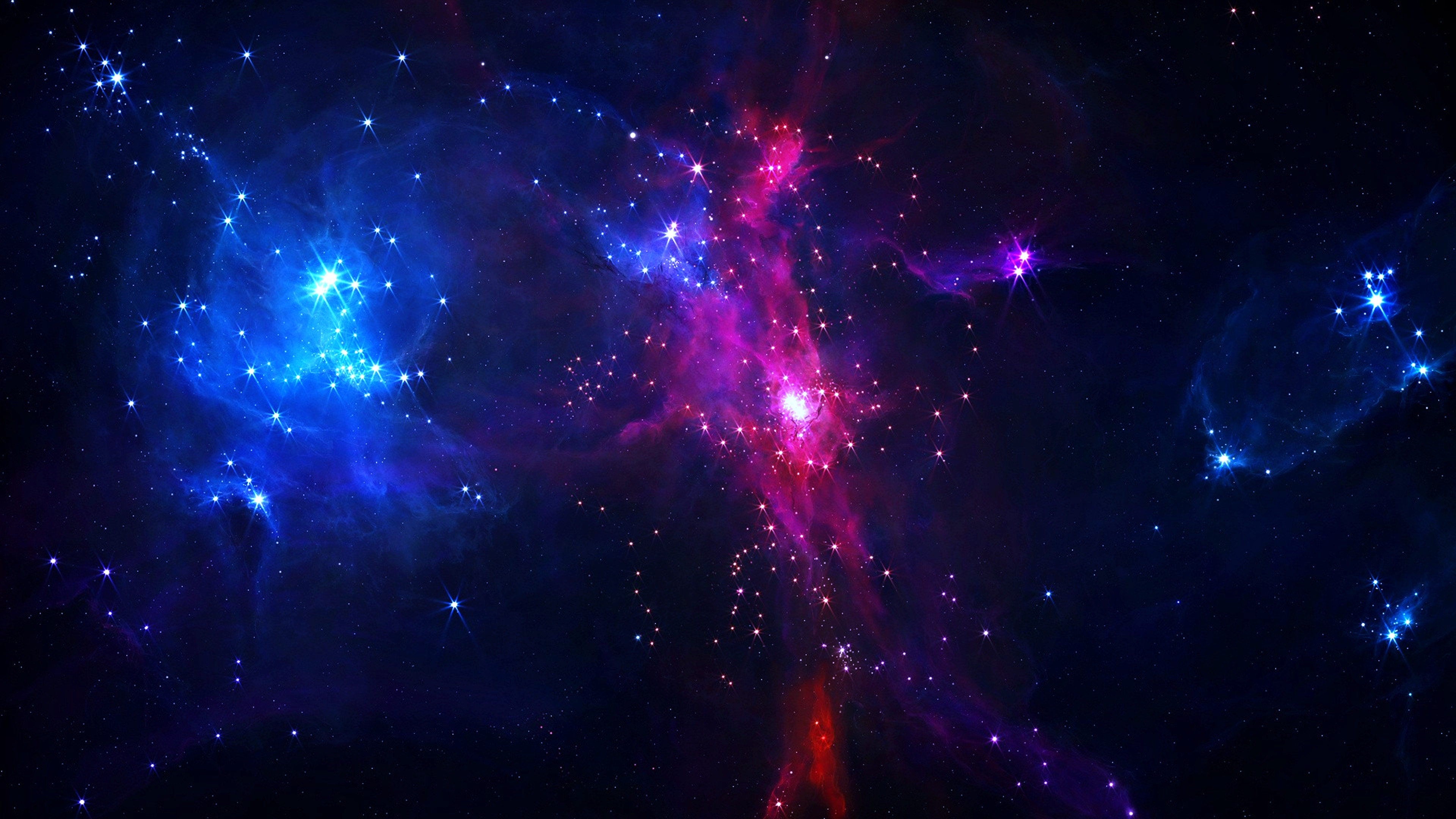 Vivid nebulae in vibrant hues of blue, pink, and purple, set against a backdrop of a starry night sky