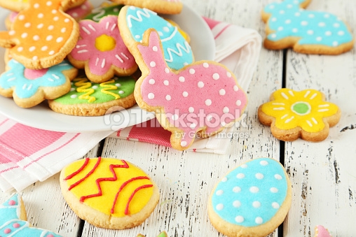 Easter Cookies On White Wooden Background Stock Photo Thinkstock
