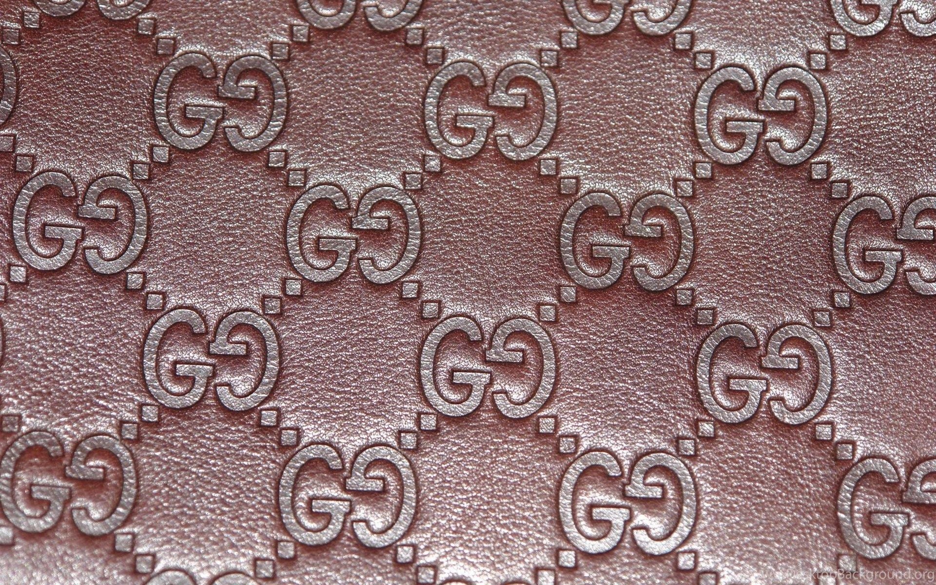 Close-up of Rose Gold Gucci GG Pattern Wallpaper
