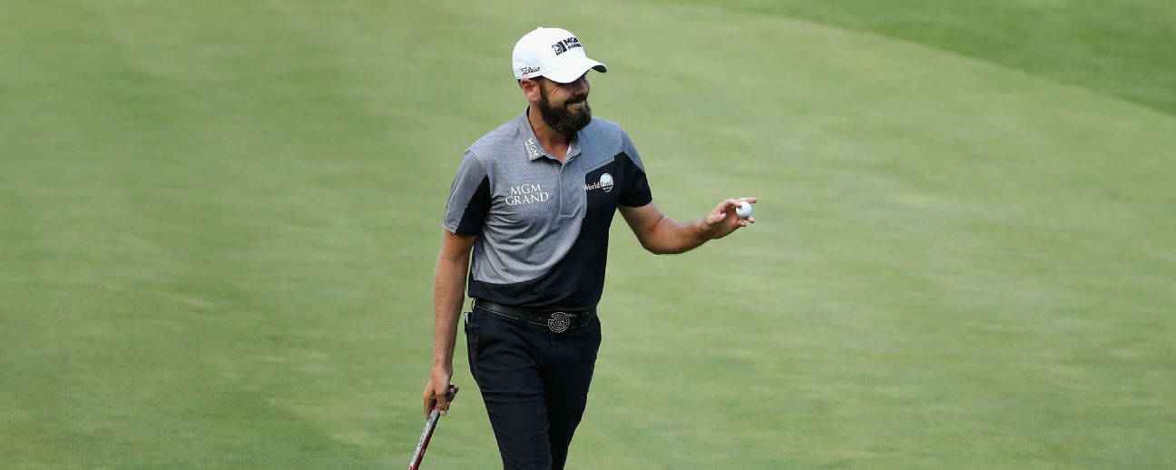 Professional Golfer Troy Merritt In Action On The Course Wallpaper