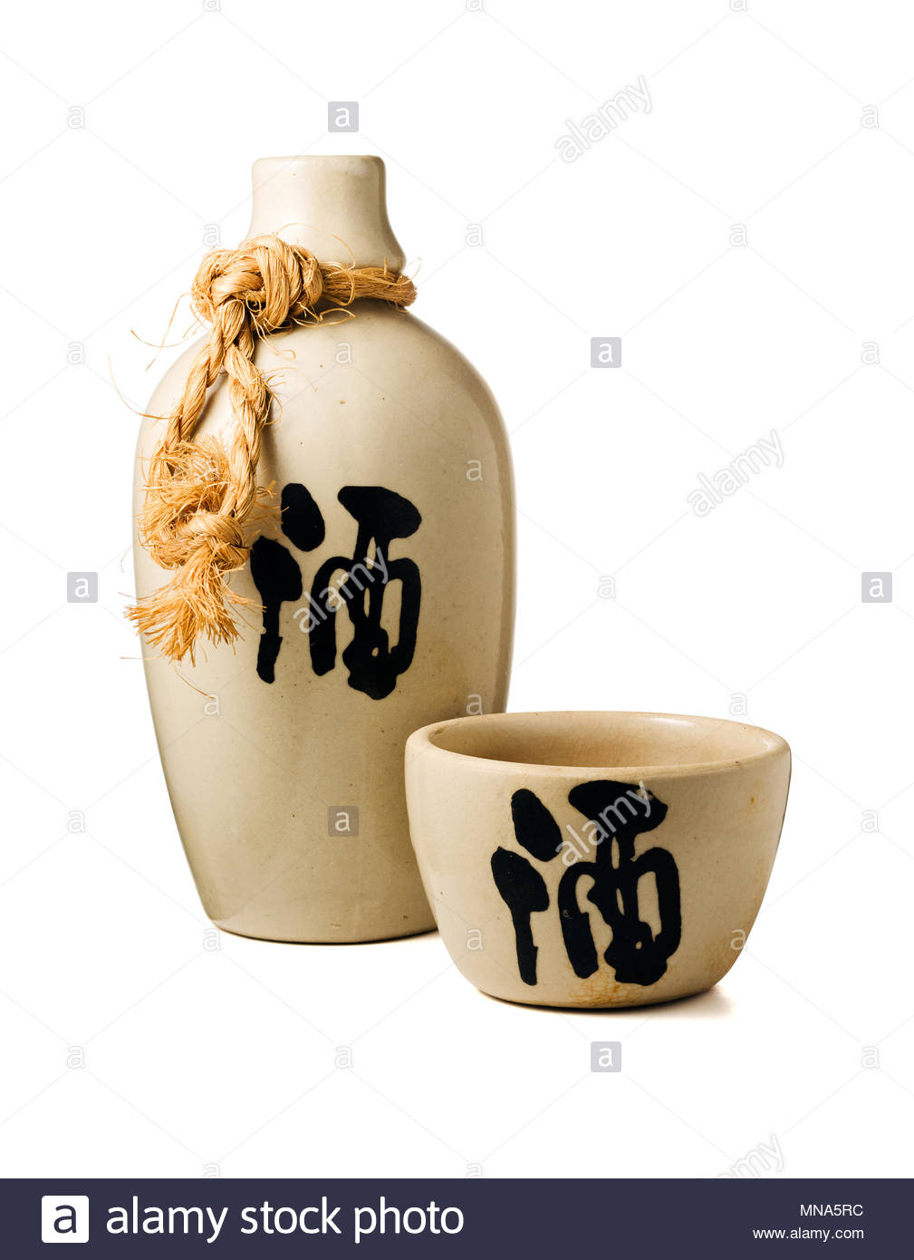 Sake Bottle And Cup With The Ideogram For Liquor On Both