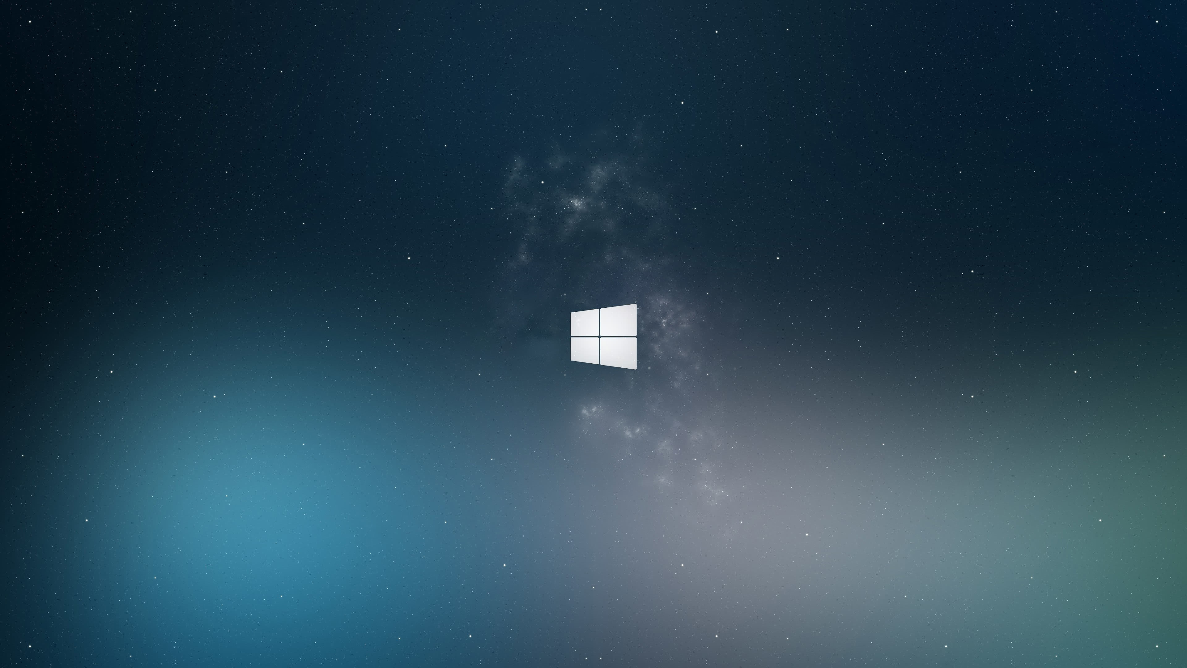 Windows 10 logo against a starry night sky background