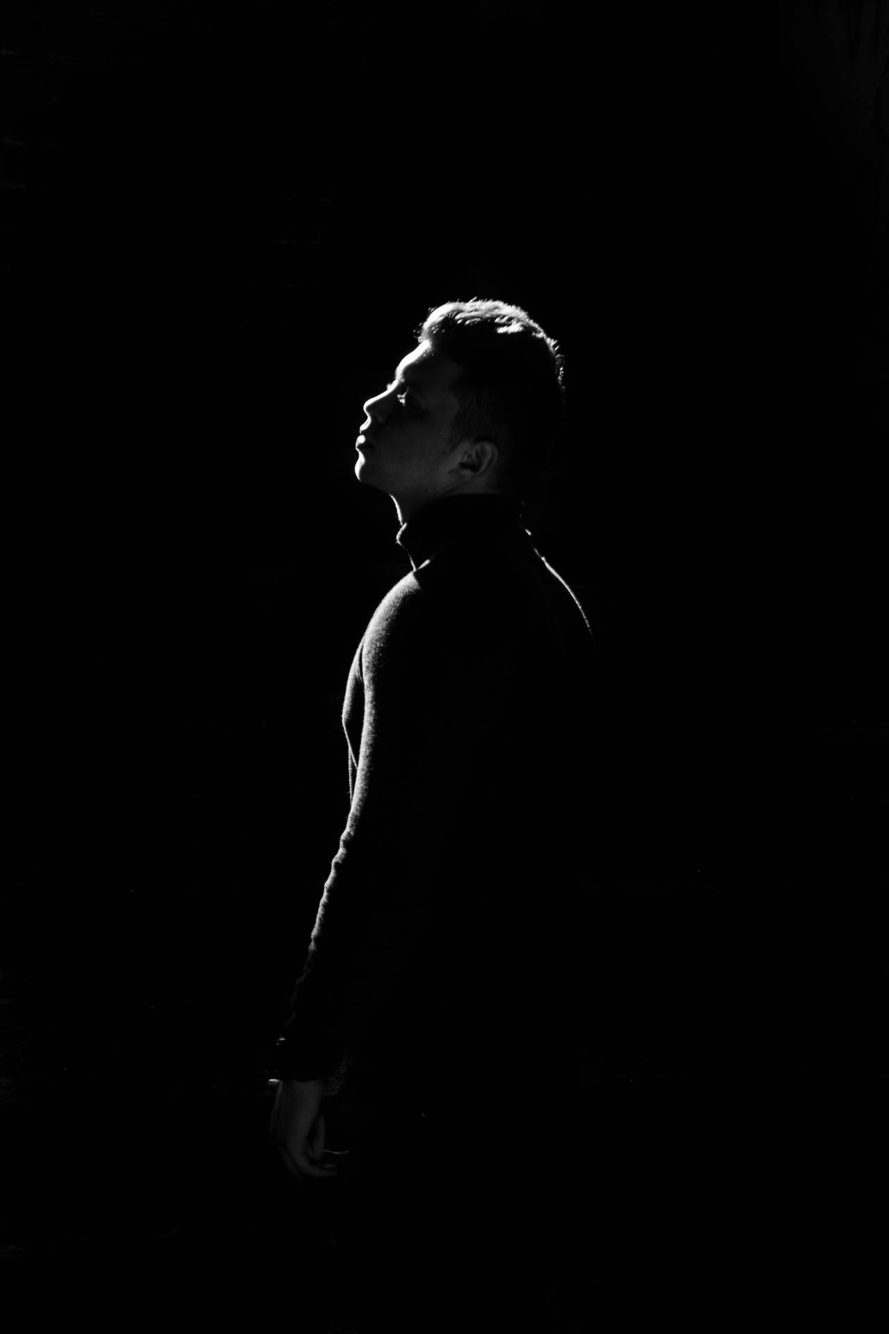 Dynamic Male Pose Silhouette Wallpaper