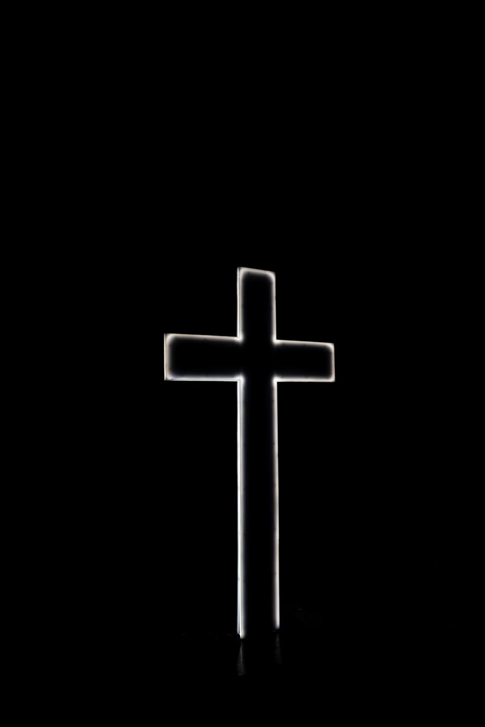 White Cross With Black Background Photo Image