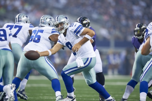 Tony Romo In Action Handoff To Dallas Cowboys Running Back