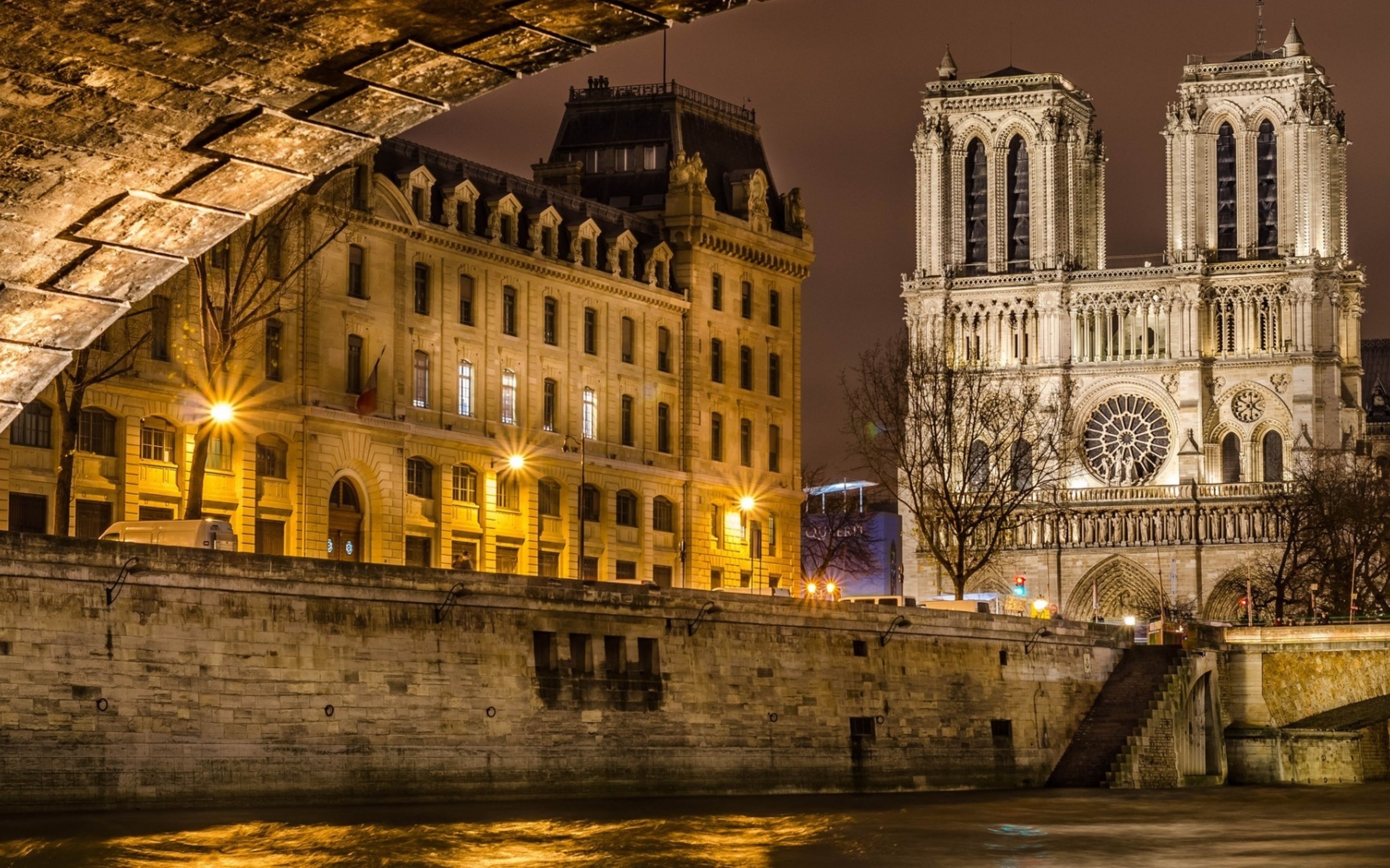 Notre Dame Cathedral From Paris Lighted In Night