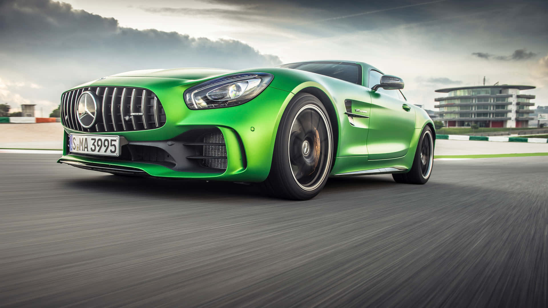 Zooming Green Colored Mercedes Amg Gt R Background Wallpaper