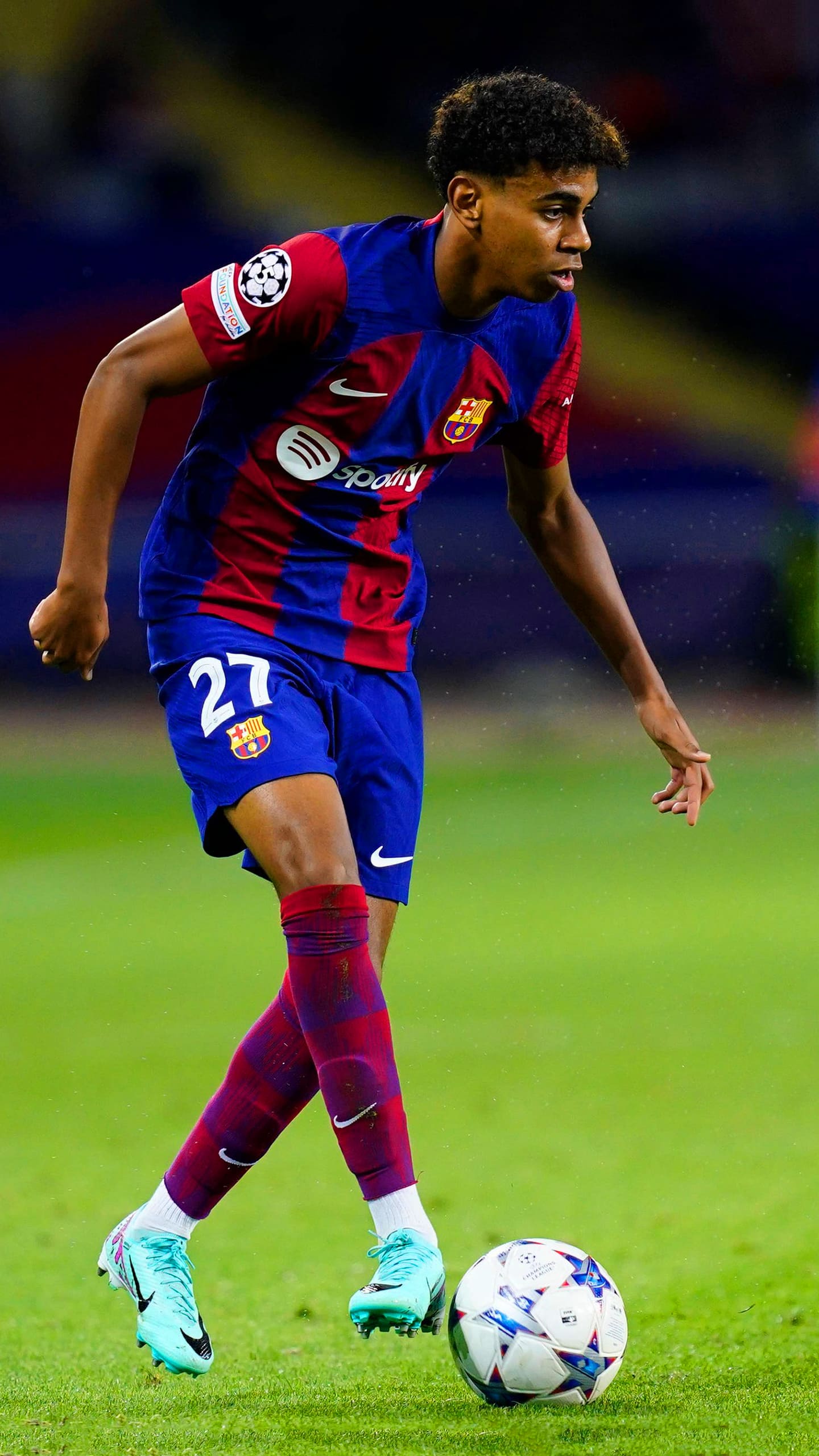 Lamine Yamal of FC Barcelona dribbling the ball during a match