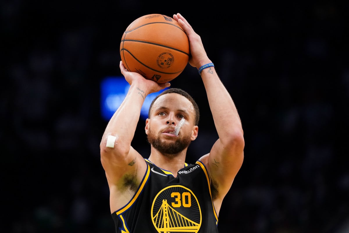 Stephen Curry of the Golden State Warriors prepares to shoot a basketball