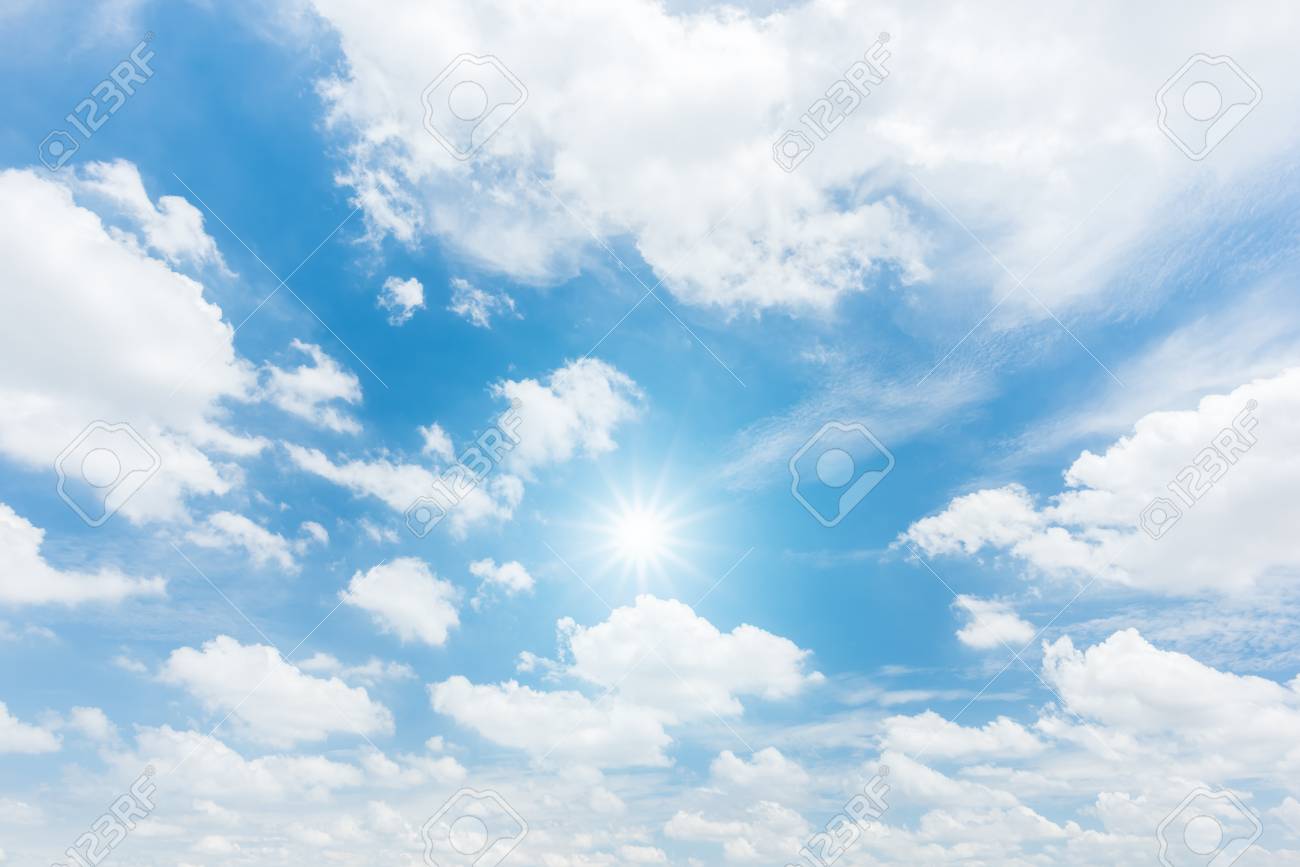 Sun With Sunlight In Cloud On Blue Sky Background Stock Photo