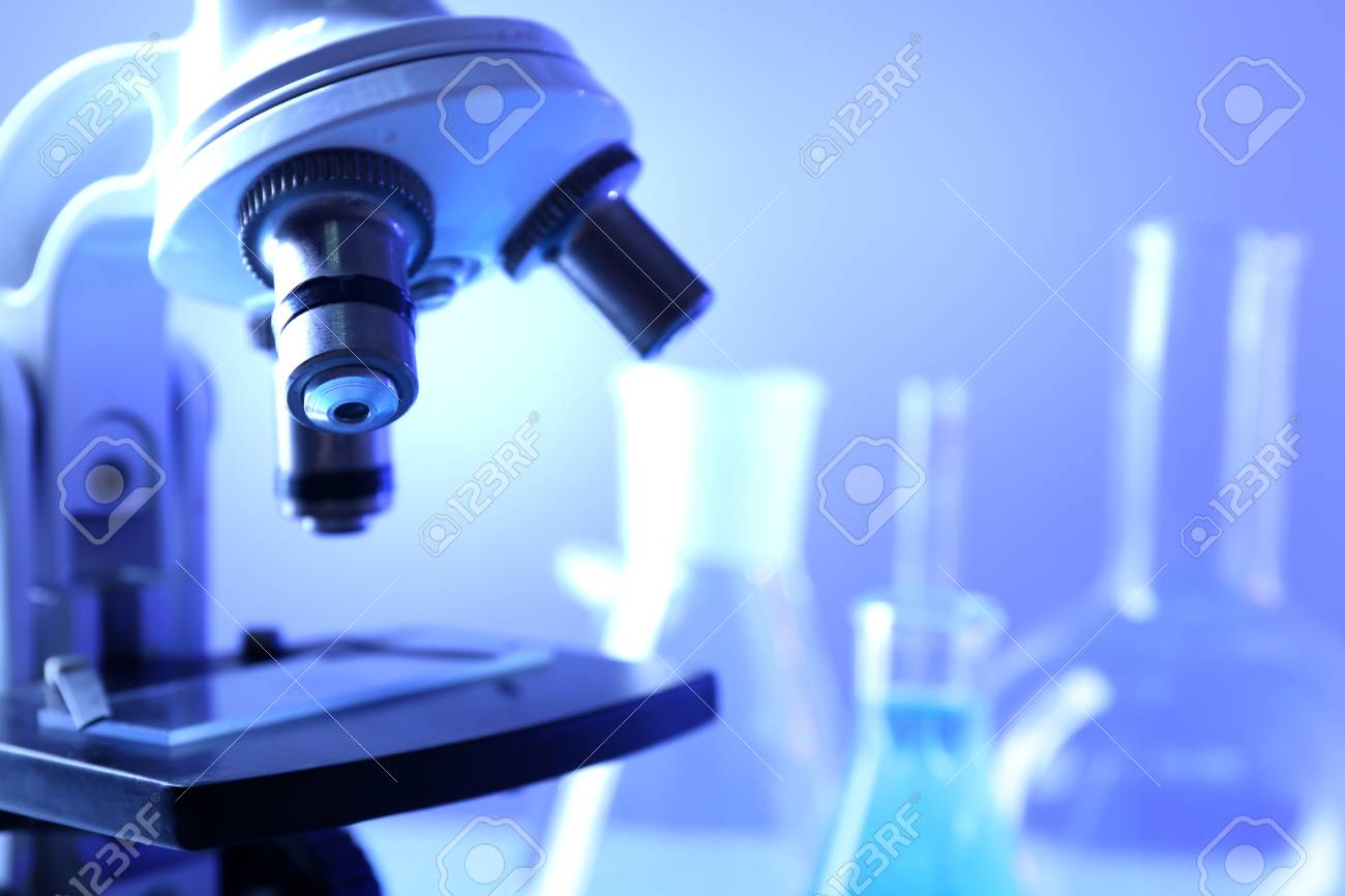 Microscope Close Up On Color Background Stock Photo Picture And