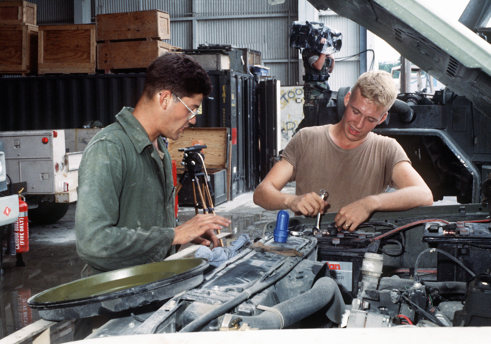 Free download Two Seabees perform preventive maintenance on a truck ...