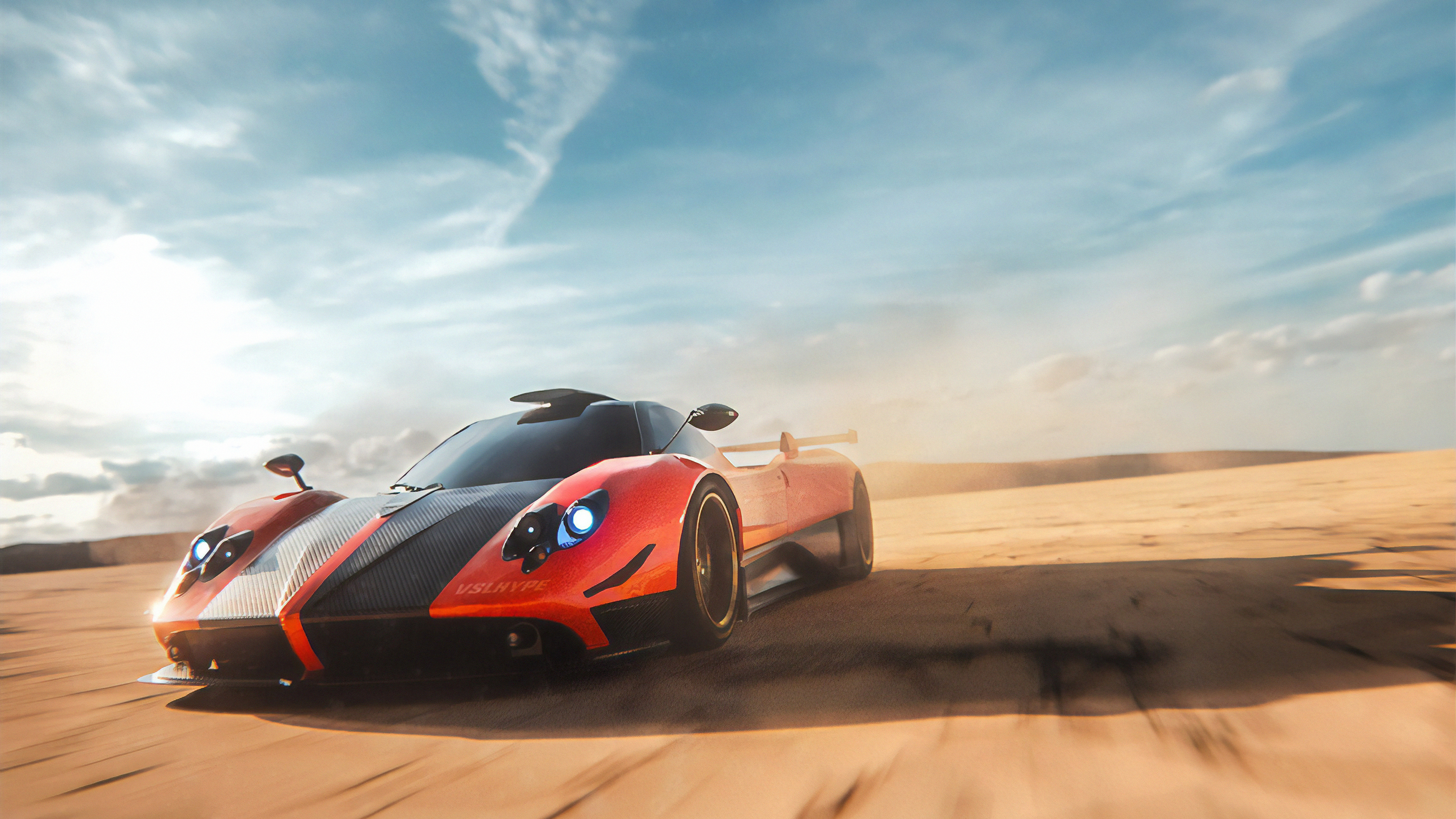 A vibrant orange Pagani Huayra races across a desert landscape, kicking up sand in its wake